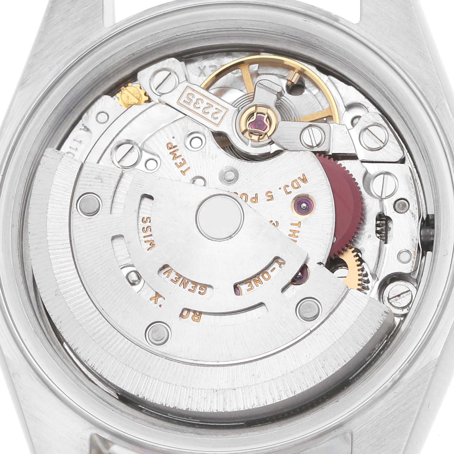 The image shows the movement mechanism of a Rolex Datejust model 79173 from the back, highlighting the rotor and gears.