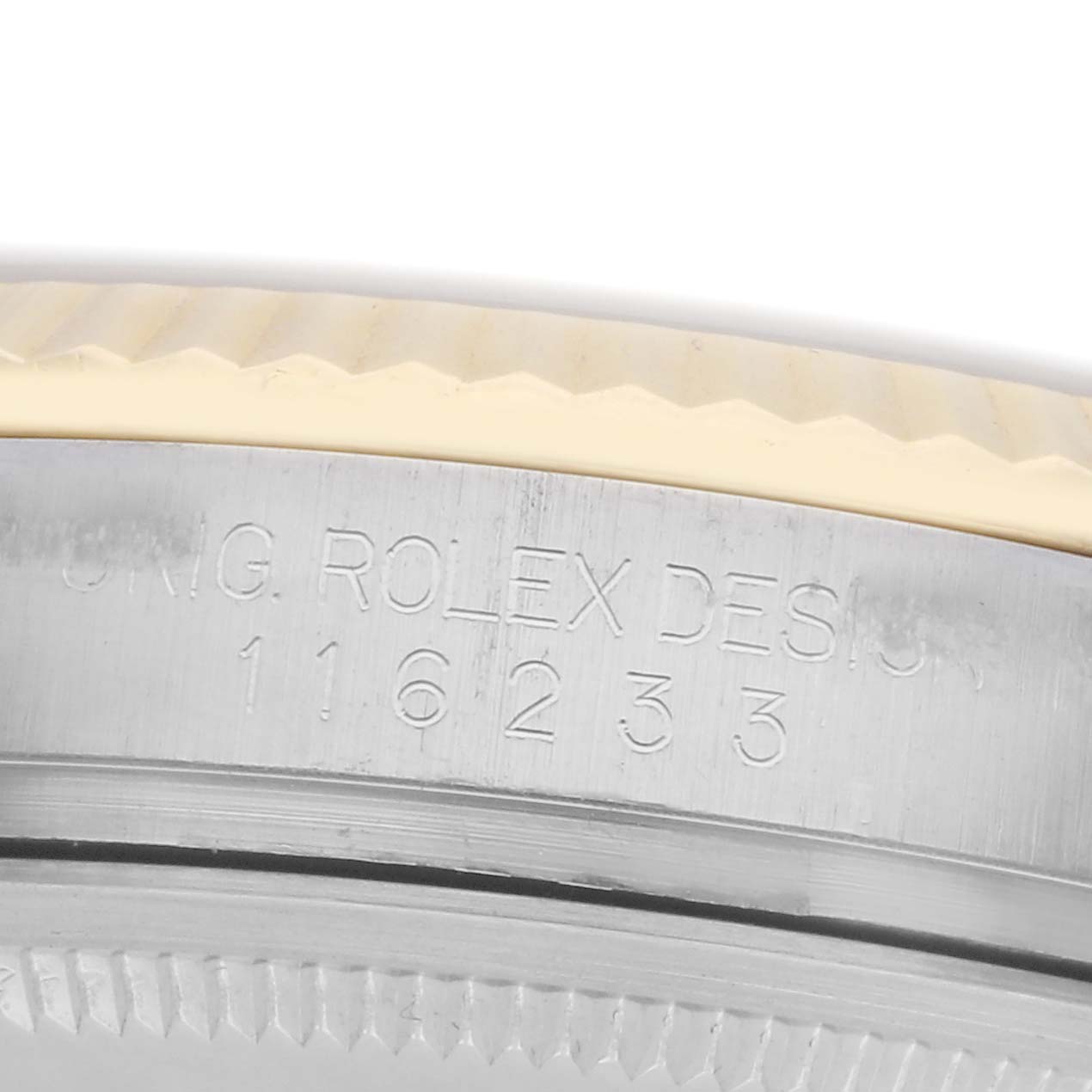 The image shows a close-up of the side of a Rolex Datejust, model number 116233, highlighting the engraved text on the watch case.