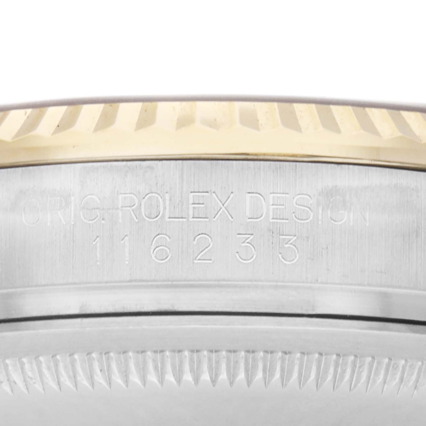 The image shows the side of a Rolex Datejust men
s watch, model 116233, highlighting the fluted bezel and engraved model number on the case.