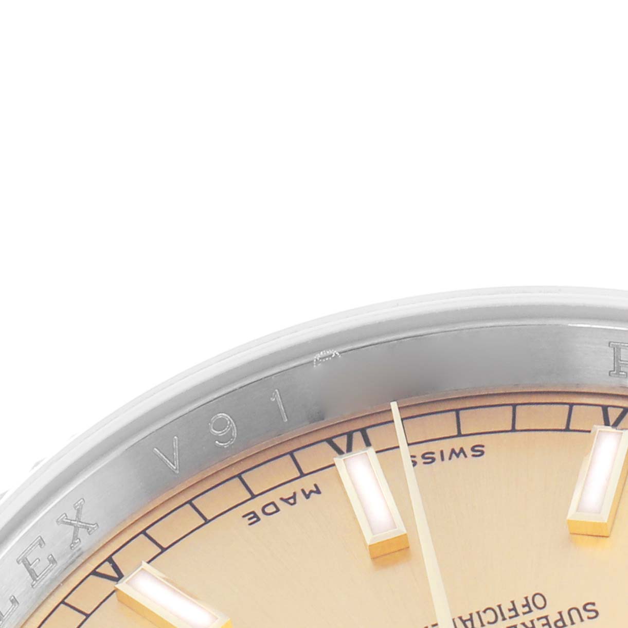 The image shows a close-up of the Rolex Datejust model 116233, featuring the bezel, part of the dial with hour markers, and "ROLEX" engraving.