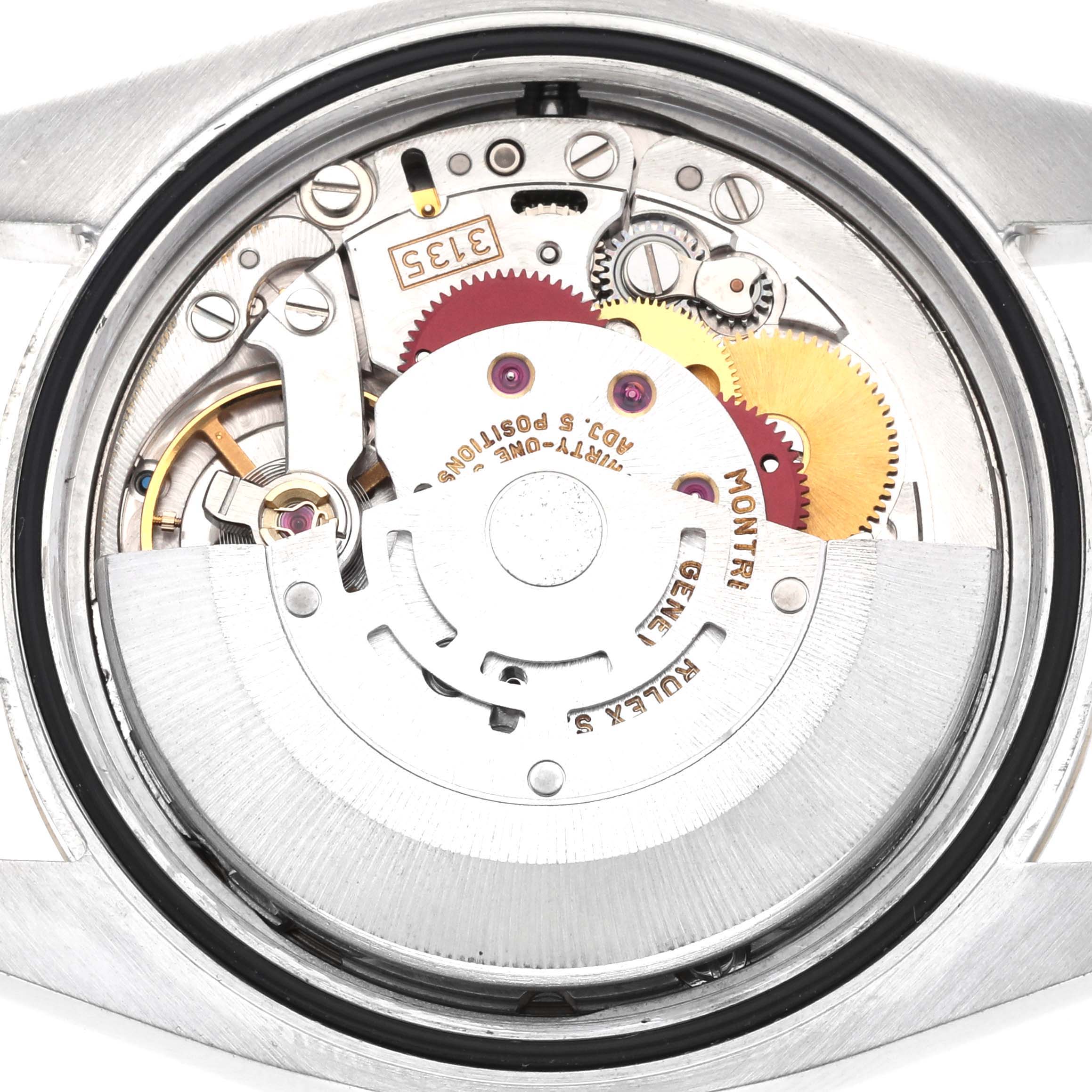 The image shows a close-up view of the movement inside a Rolex Datejust model 116233 men
s watch, highlighting the intricate mechanical parts.