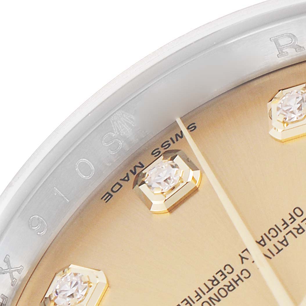The image shows a close-up of a Rolex Datejust model 116233 watch, highlighting the bezel, part of the dial, and diamond hour markers.