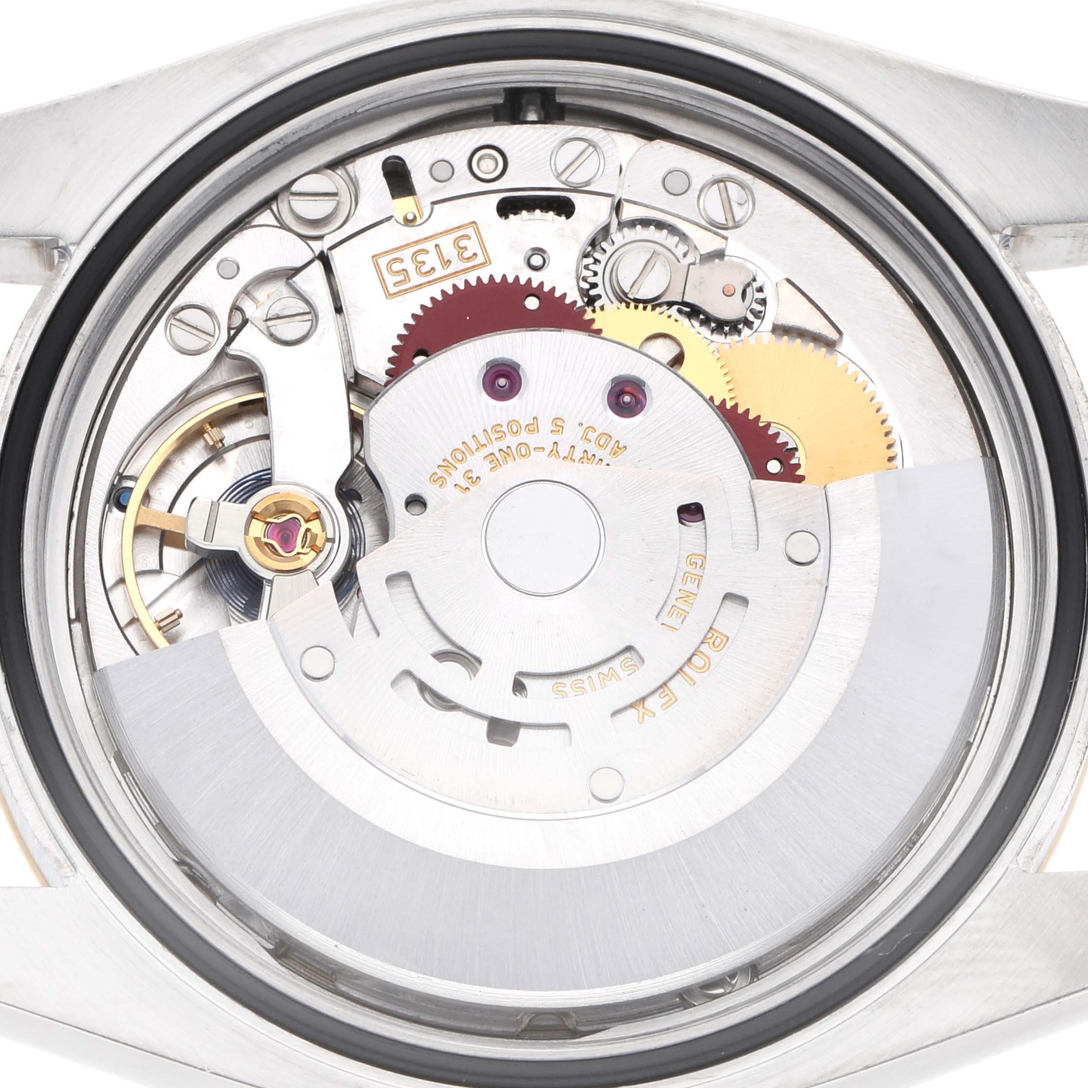 The image shows the movement of a Rolex Datejust men
s watch, model number 116233, from a rear view, highlighting its intricate mechanical components.