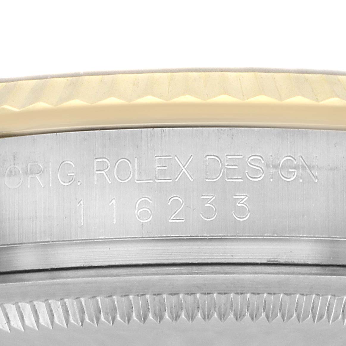 The image shows the side of a Rolex Datejust watch, model number 116233, focusing on the engraving of the brand and model number on the watch case.