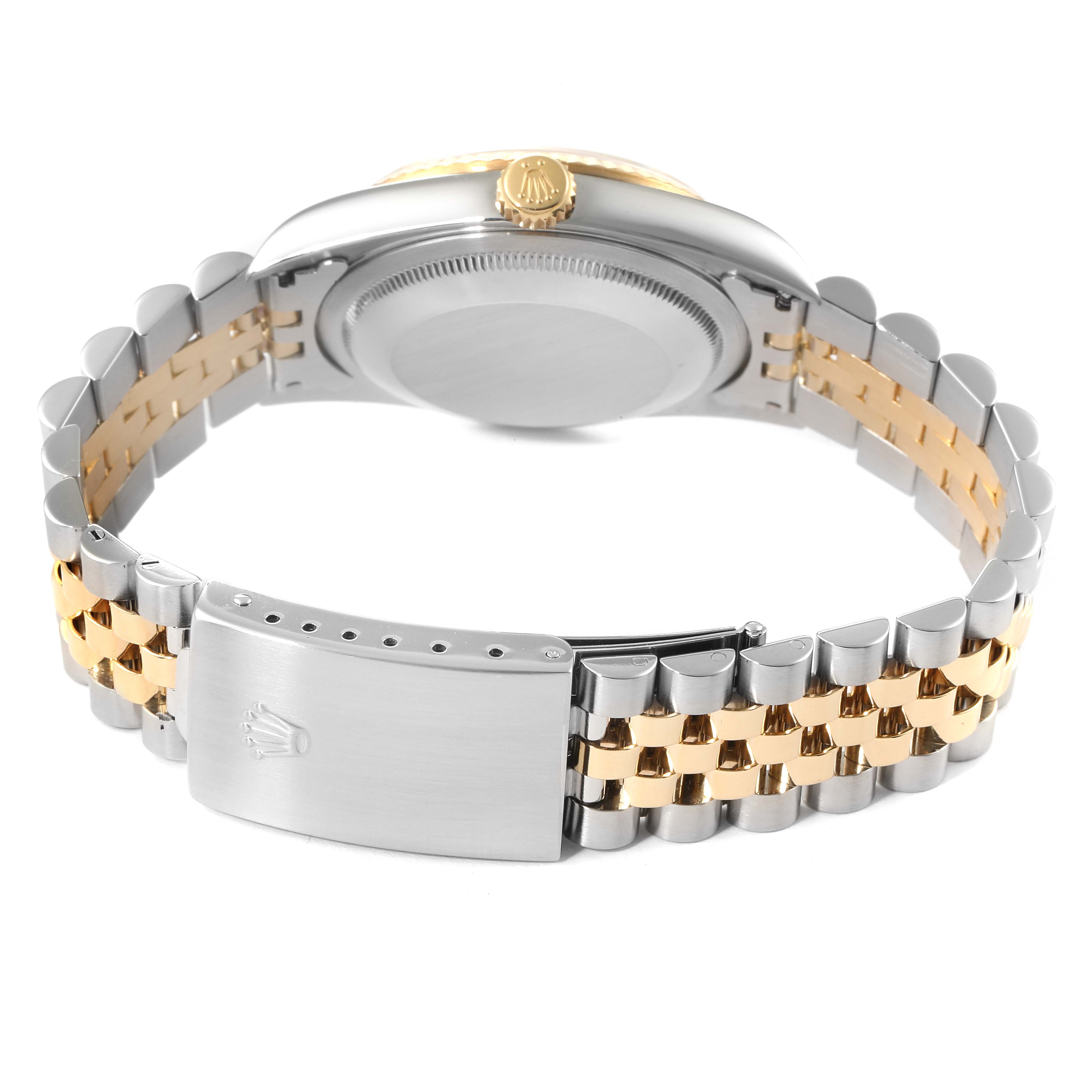 The image displays the back and clasp of a Rolex Datejust 16233 Men's Steel and Gold (two tone) Champagne Dial 16233 Men's Steel and Gold (two tone) Champagne Dial watch, highlighting its two-tone metal bracelet.