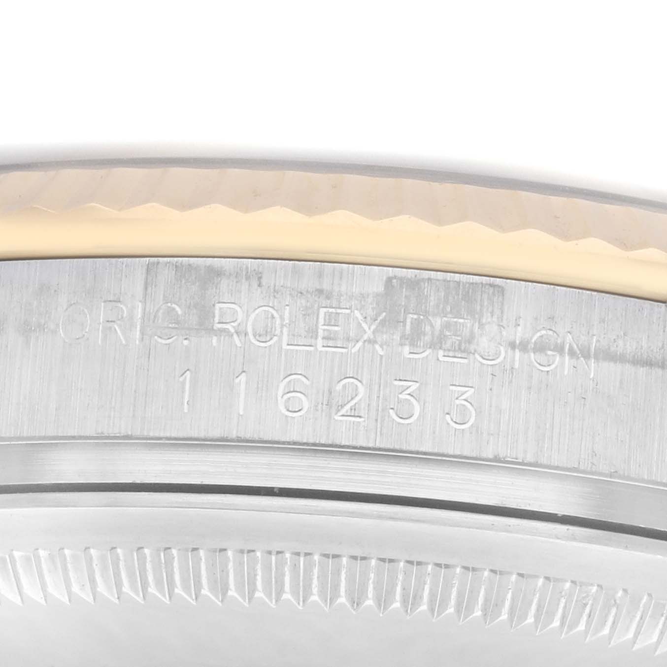 The image shows a close-up of the side of a Rolex Datejust Men’s watch, model 116233, highlighting the engraved model number and part of the bezel.