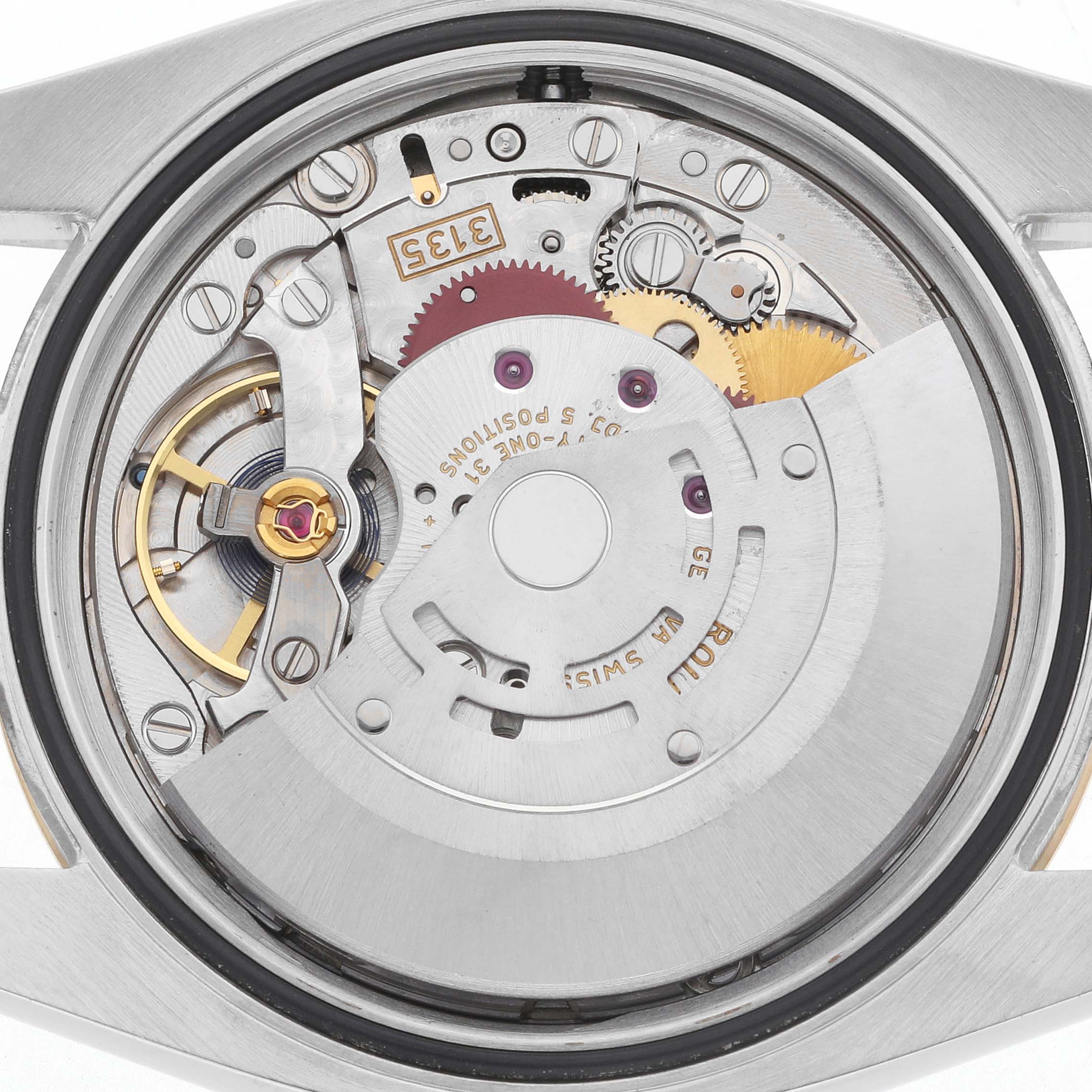 The image shows the movement of a Rolex Datejust model 116233, highlighting the intricate inner mechanics from the back.