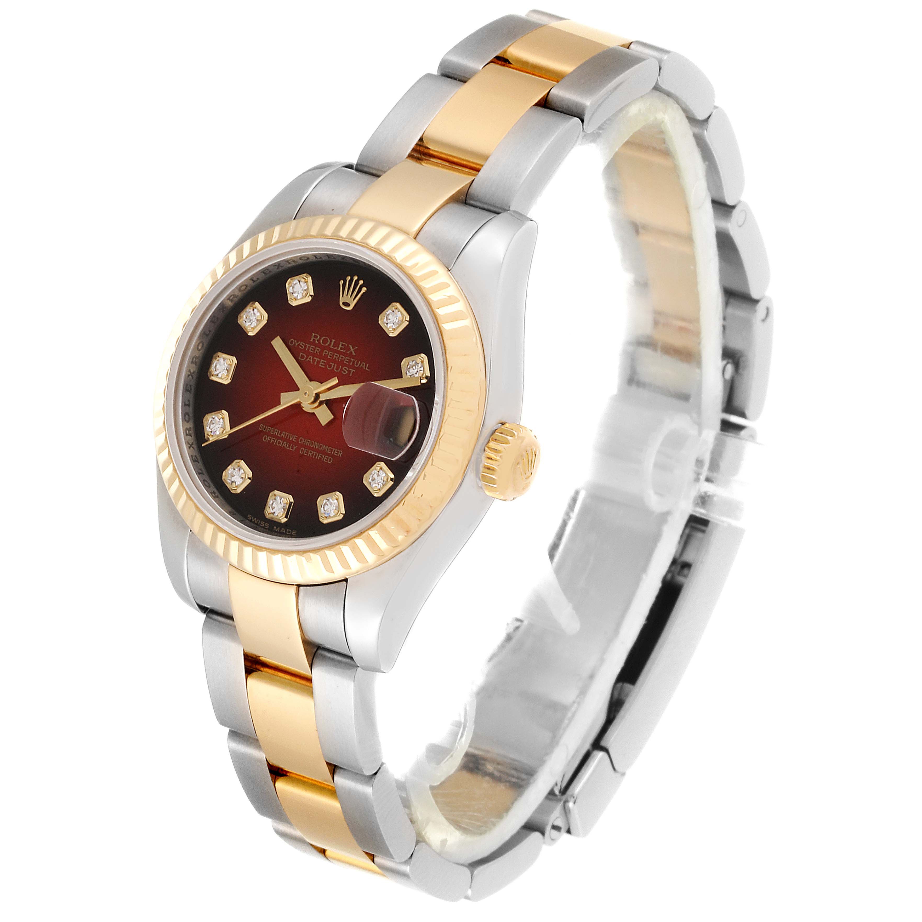 The image shows a Rolex Datejust 179173 Women's Steel and Gold (two tone) Red Dial 179173 Women's Steel and Gold (two tone) Red Dial watch at a slight angle, highlighting its dial, bezel, crown, and two-tone bracelet.