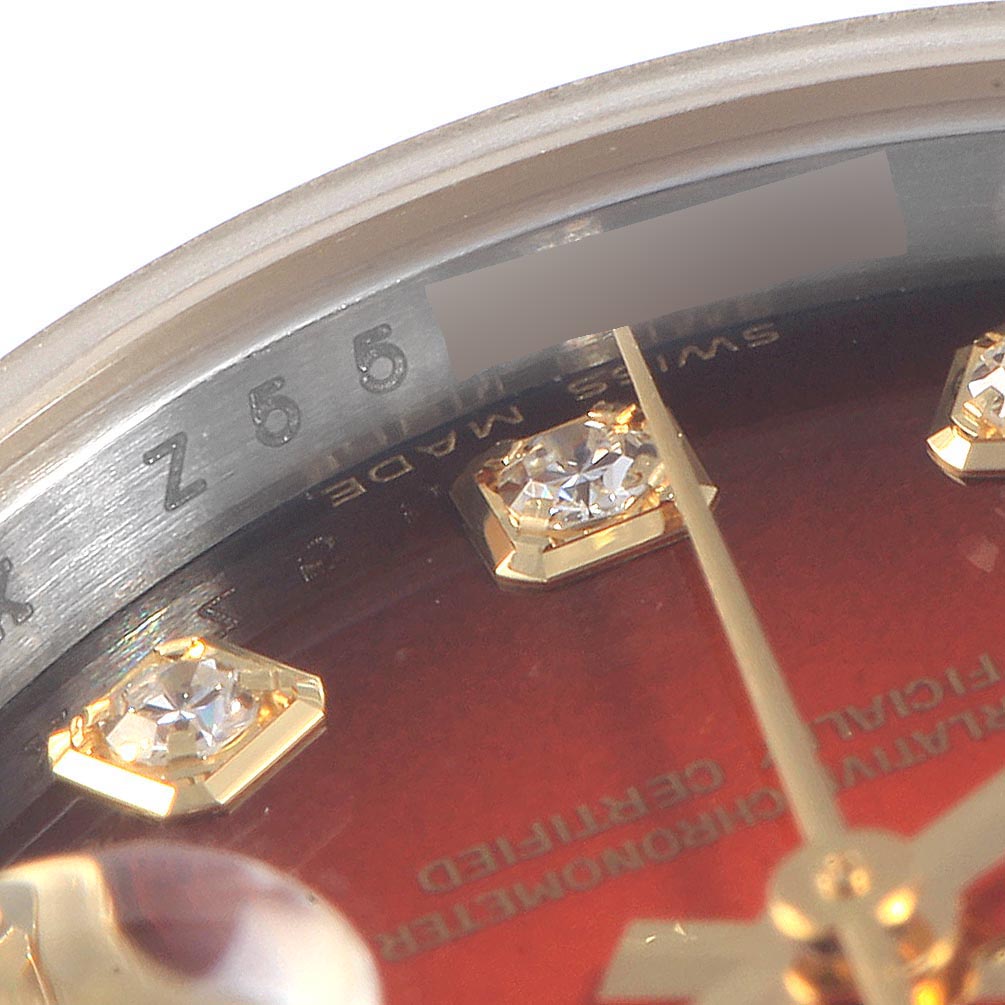 This is a close-up angle showing the dial and diamond hour markers of a Rolex Datejust 179173 Women's Steel and Gold (two tone) Red Dial 179173 Women's Steel and Gold (two tone) Red Dial watch.