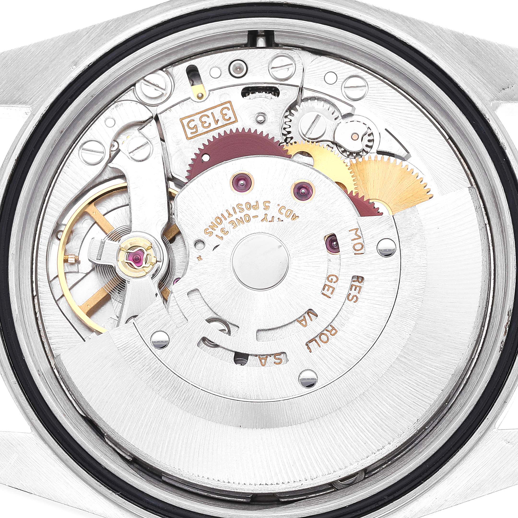 This is a close-up view of the movement mechanism of a Rolex Datejust 16233 Men's Steel and Gold (two tone) Silver Dial 16233 Men's Steel and Gold (two tone) Silver Dial watch.