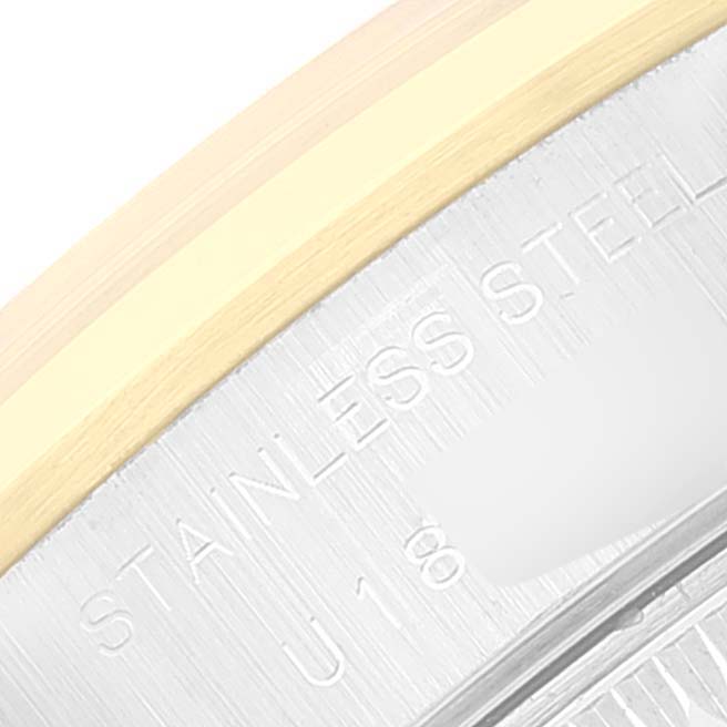 The image shows a close-up of the stainless steel side of a Rolex Datejust 69163 Women's Steel and Gold (two tone) Grey Dial 69163 Women's Steel and Gold (two tone) Grey Dial watch, highlighting its engraved details.