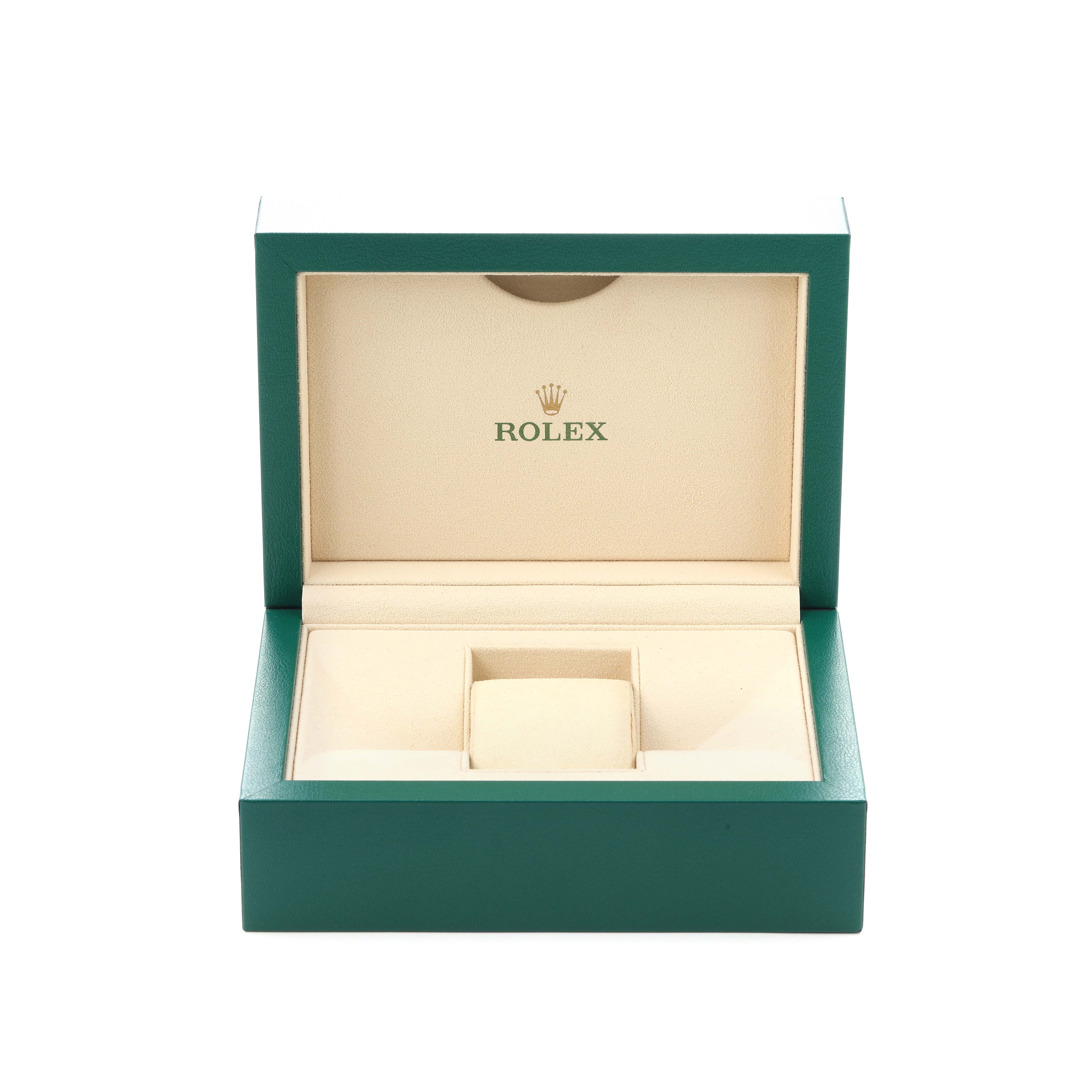 The image shows an open green Rolex box for the Datejust model 116233, revealing its beige interior designed to hold the men
s watch.