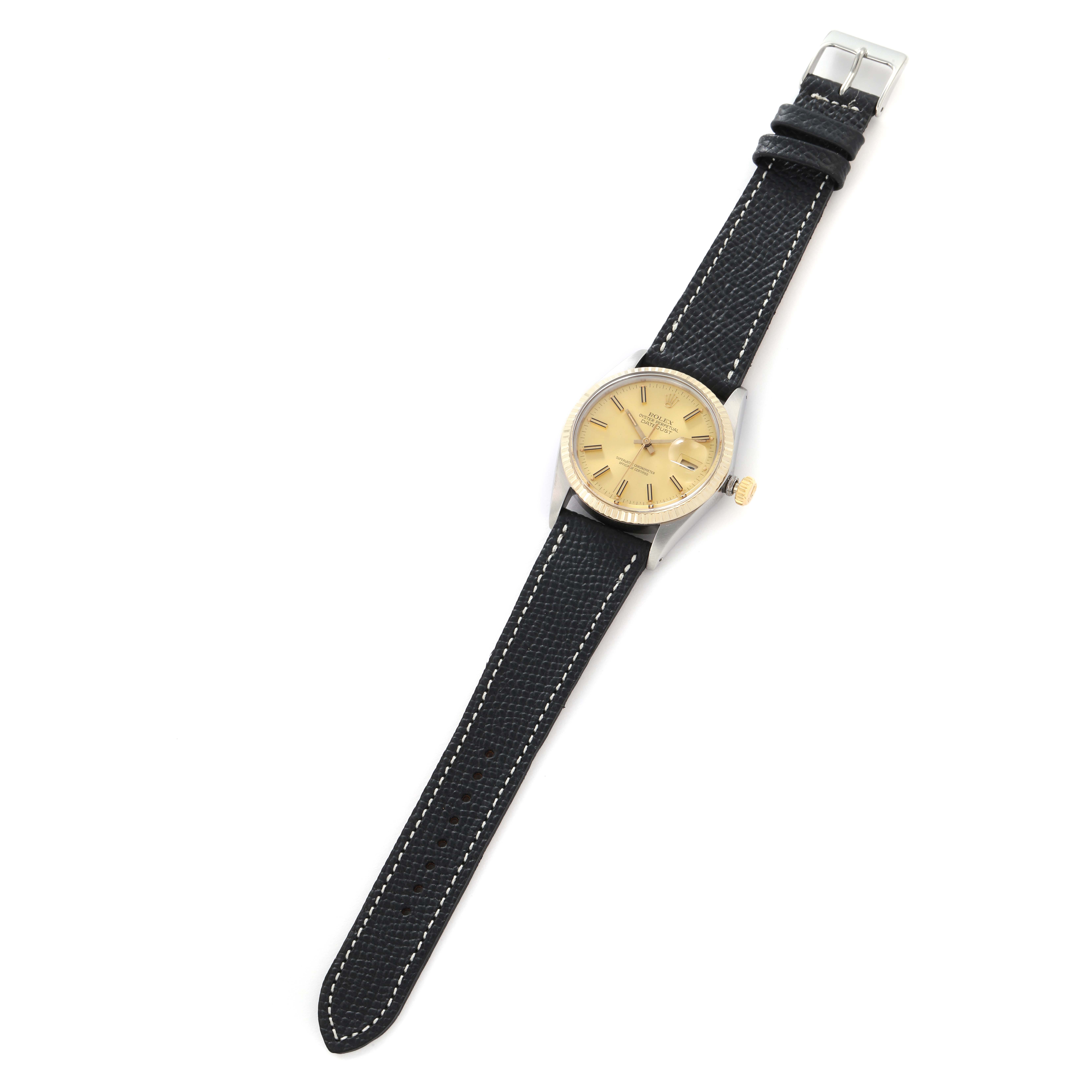 The Rolex Datejust model 16013 is shown from a top-down angle, featuring the watch face, bezel, crown, and full leather strap with a buckle.