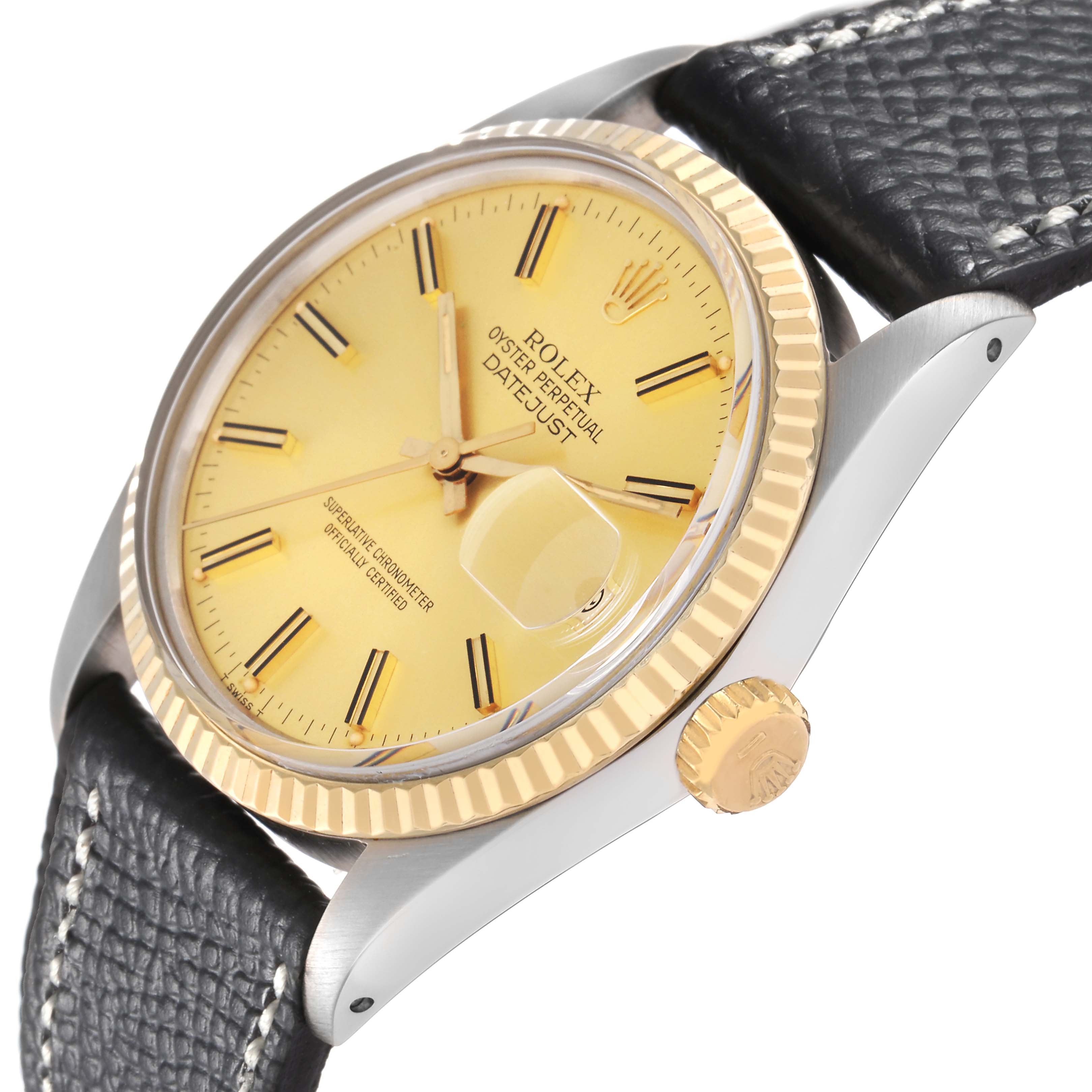 The image shows a Rolex Datejust model 16013, angled to display the gold fluted bezel, crown, dial, and black leather strap.