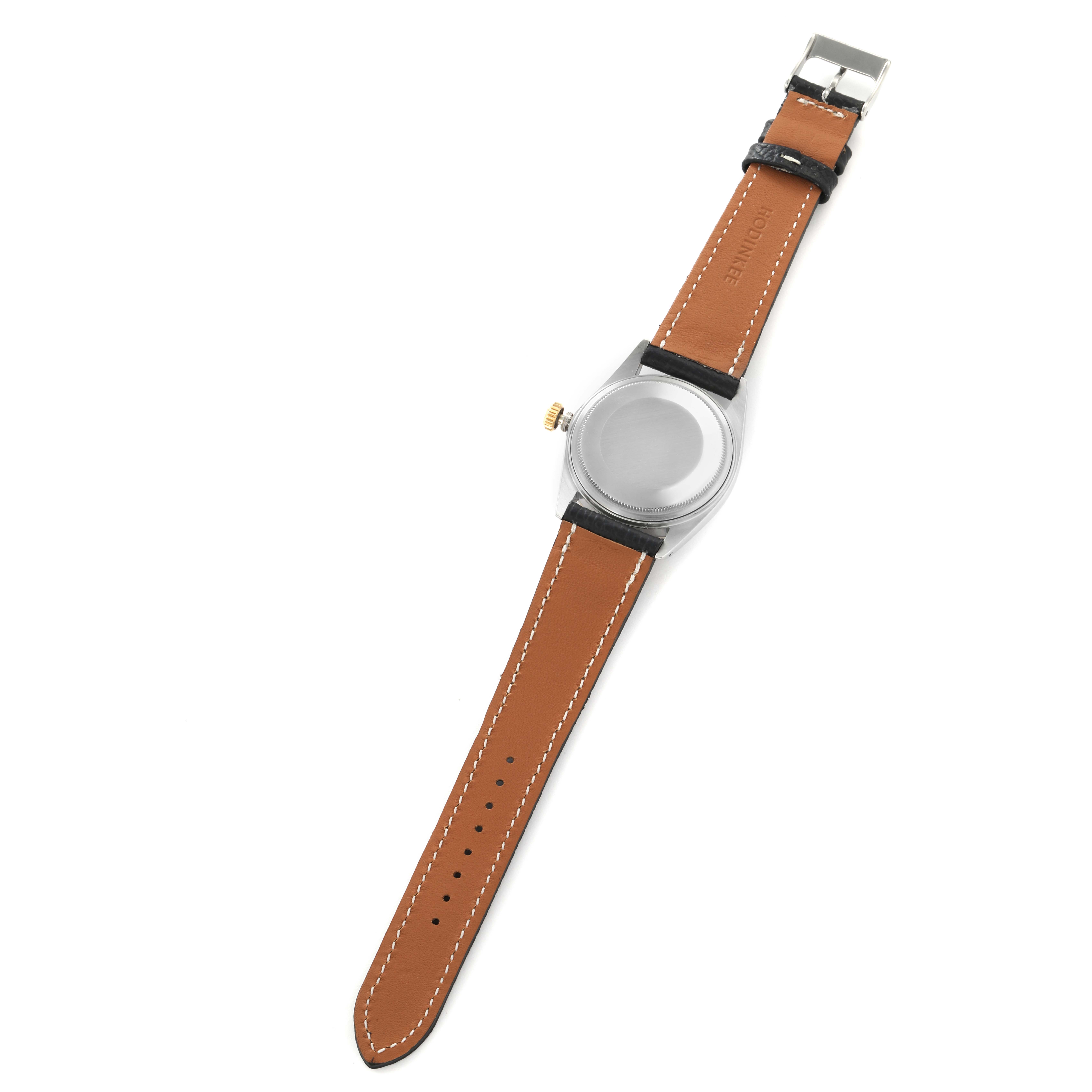 The image shows the back view of a Rolex Datejust model 16013 men
s watch, highlighting the case back, crown, and brown leather strap.