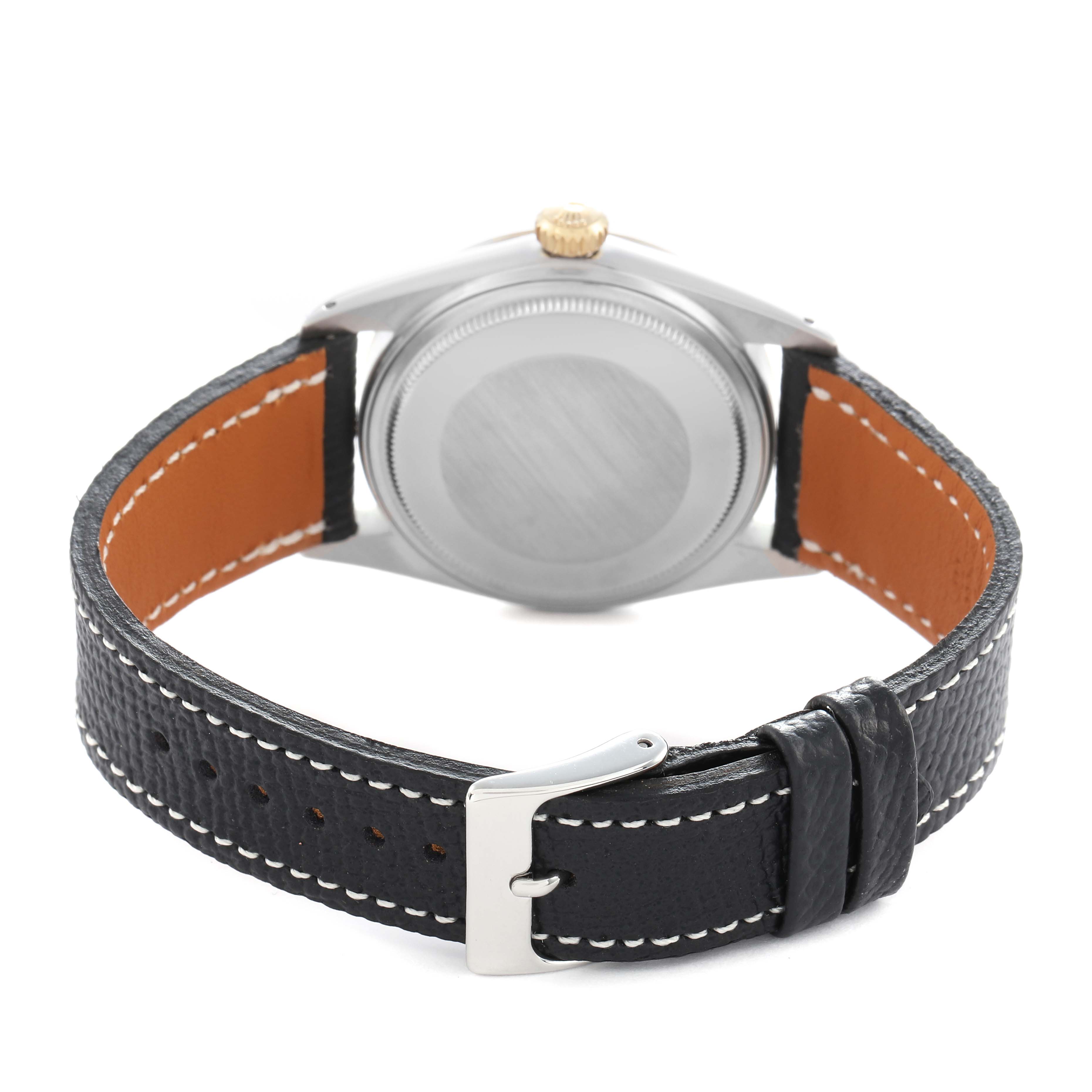 The image shows the back view of a Rolex Datejust 16013 men
s watch, highlighting the case back, leather strap, and buckle.