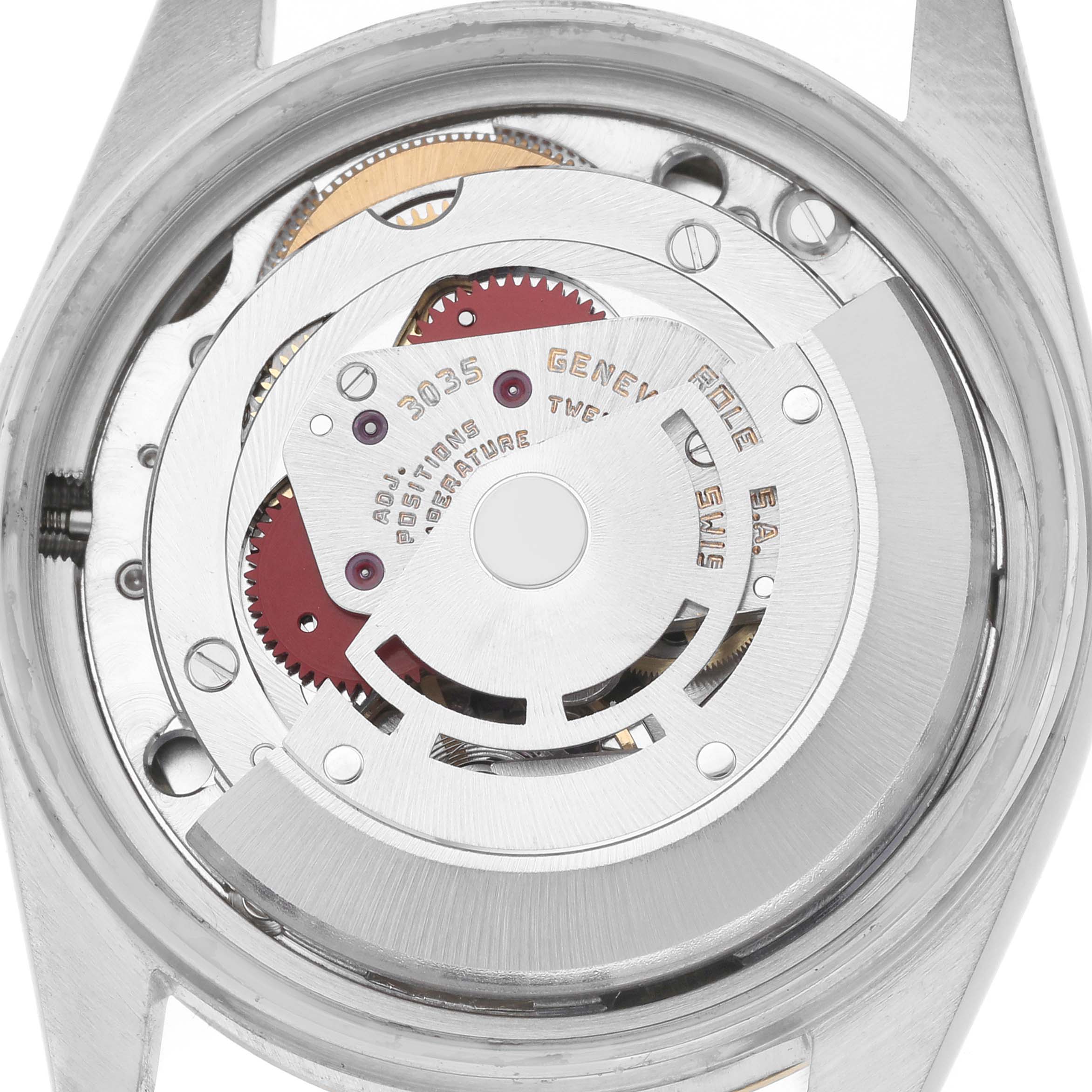 The image shows the movement of a Rolex Datejust model 16013 from a top-down angle, highlighting the intricate mechanics inside.