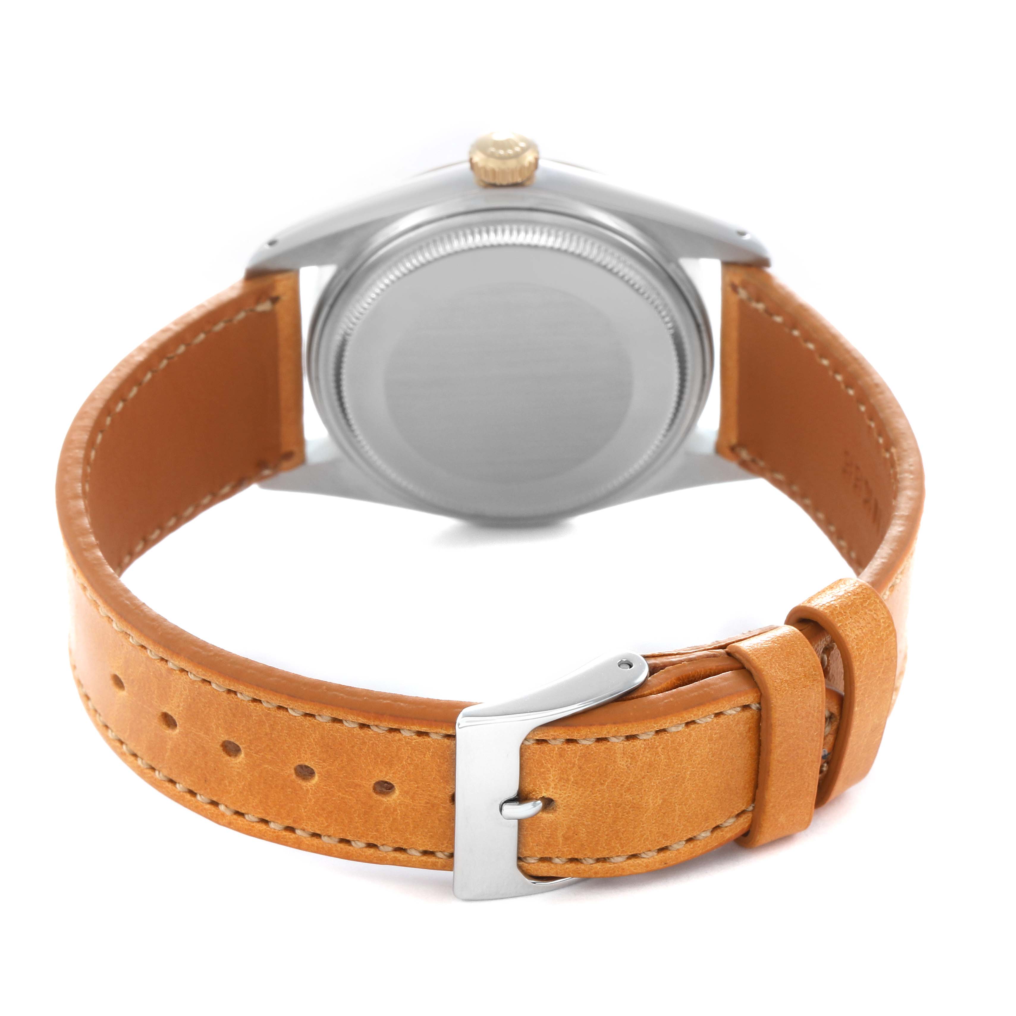 The image shows the back view of a Rolex Datejust model 16013 men
s watch, focusing on the case back and brown leather strap with a silver buckle.