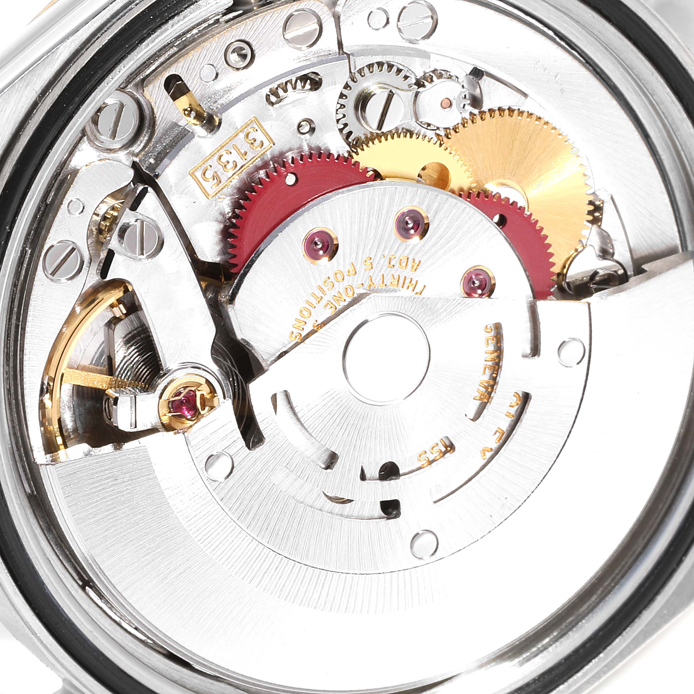 This image shows the intricate inner workings and gears of the Rolex Datejust 16233 Men
s Steel and Gold (two tone) White Dial 16233 Men
s Steel and Gold (two tone) White Dial model watch at a close-up angle.