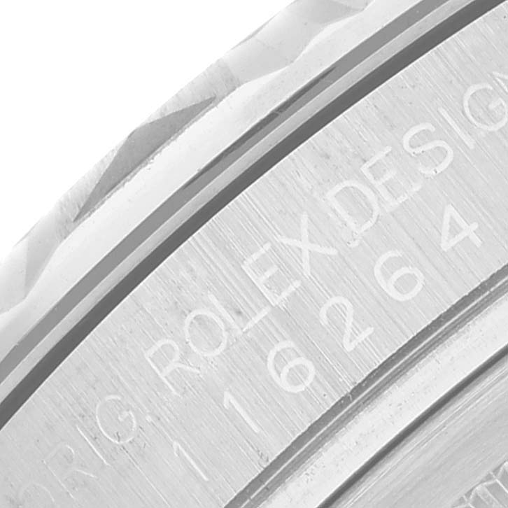 This image shows a close-up of the engraving on the bezel and case of a Rolex Turn-o-Graph 116264 Men
s Stainless Steel Blue Dial 116264 Men
s Stainless Steel Blue Dial watch.