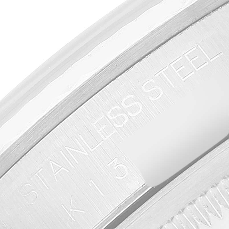 This image shows a close-up of the stainless steel engraving on a Rolex Datejust 16234 Men's Stainless Steel White Dial 16234 Men's Stainless Steel White Dial watch case.