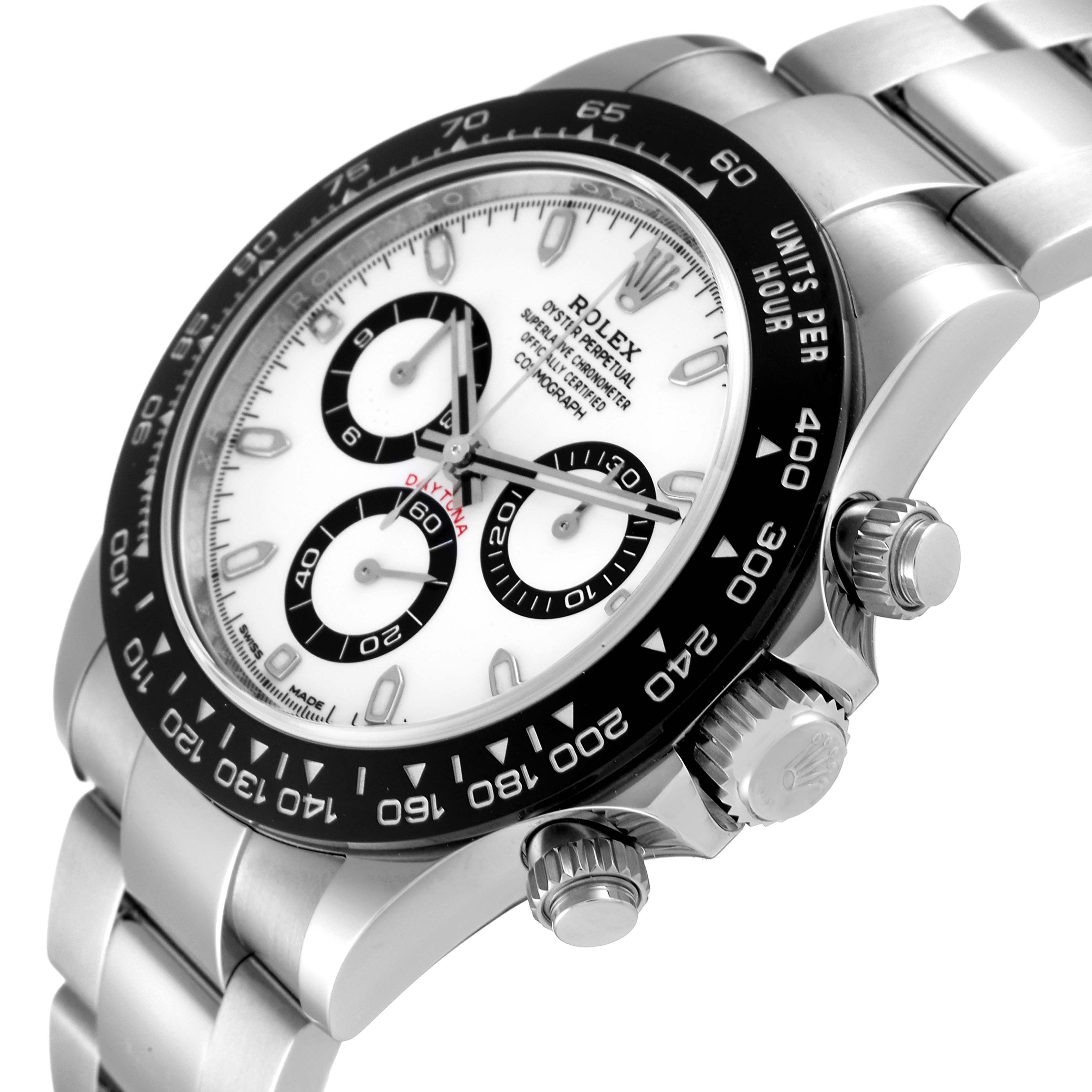 The image shows a close-up angle of a Rolex Daytona 116500 Men's Stainless Steel White Dial 116500 Men's Stainless Steel White Dial watch, highlighting the dial, bezel, and side pushers.