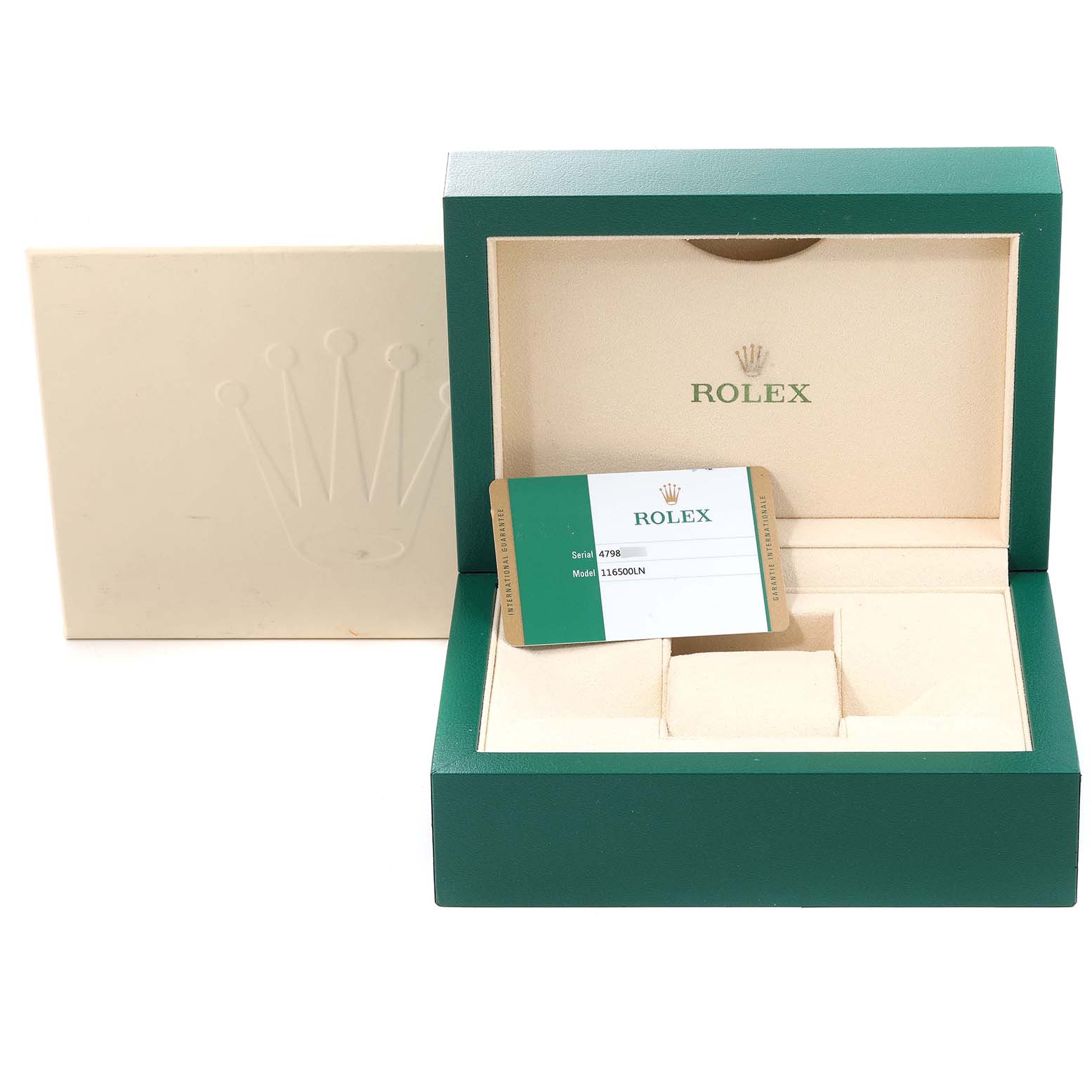 The image shows the open packaging box for a Rolex Daytona 116500 Men
s Stainless Steel White Dial 116500 Men
s Stainless Steel White Dial watch, revealing its inner compartment and certification card.