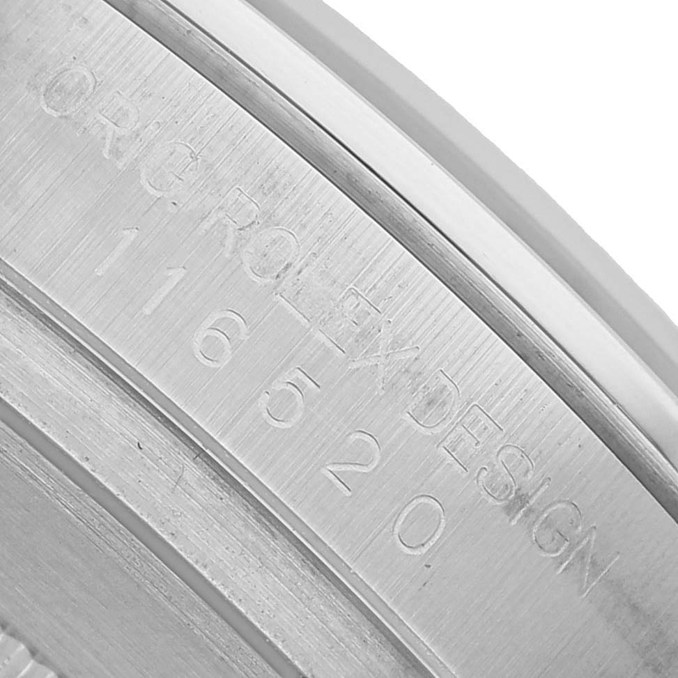 The image shows a close-up of the serial number engraving on the inner case of a Rolex Daytona 116520 Men's Stainless Steel White Dial watch.
