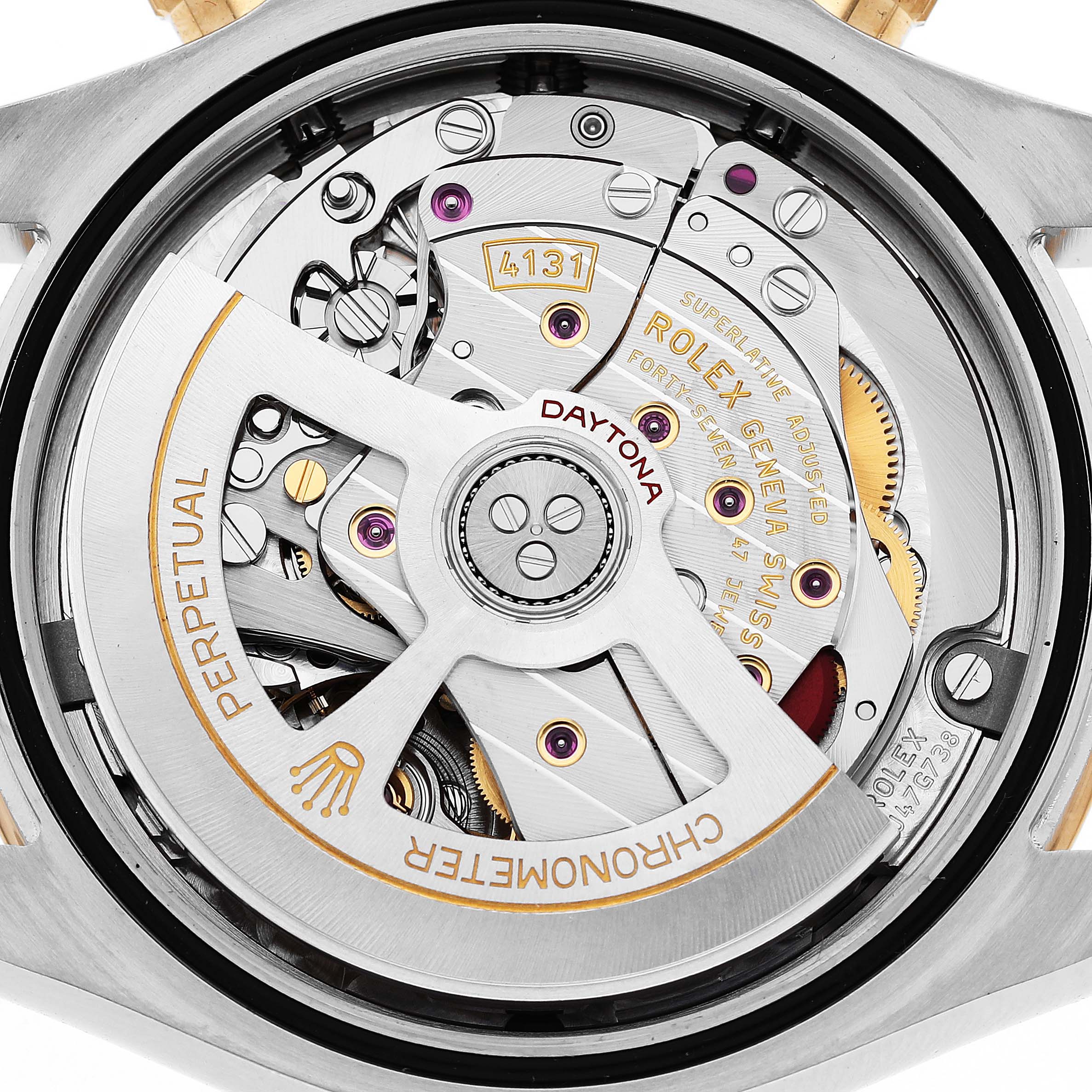 The image shows the movement of a Rolex Daytona 126503 Men's Steel and Gold (two tone) White Dial watch from the back, highlighting gears and the rotor.