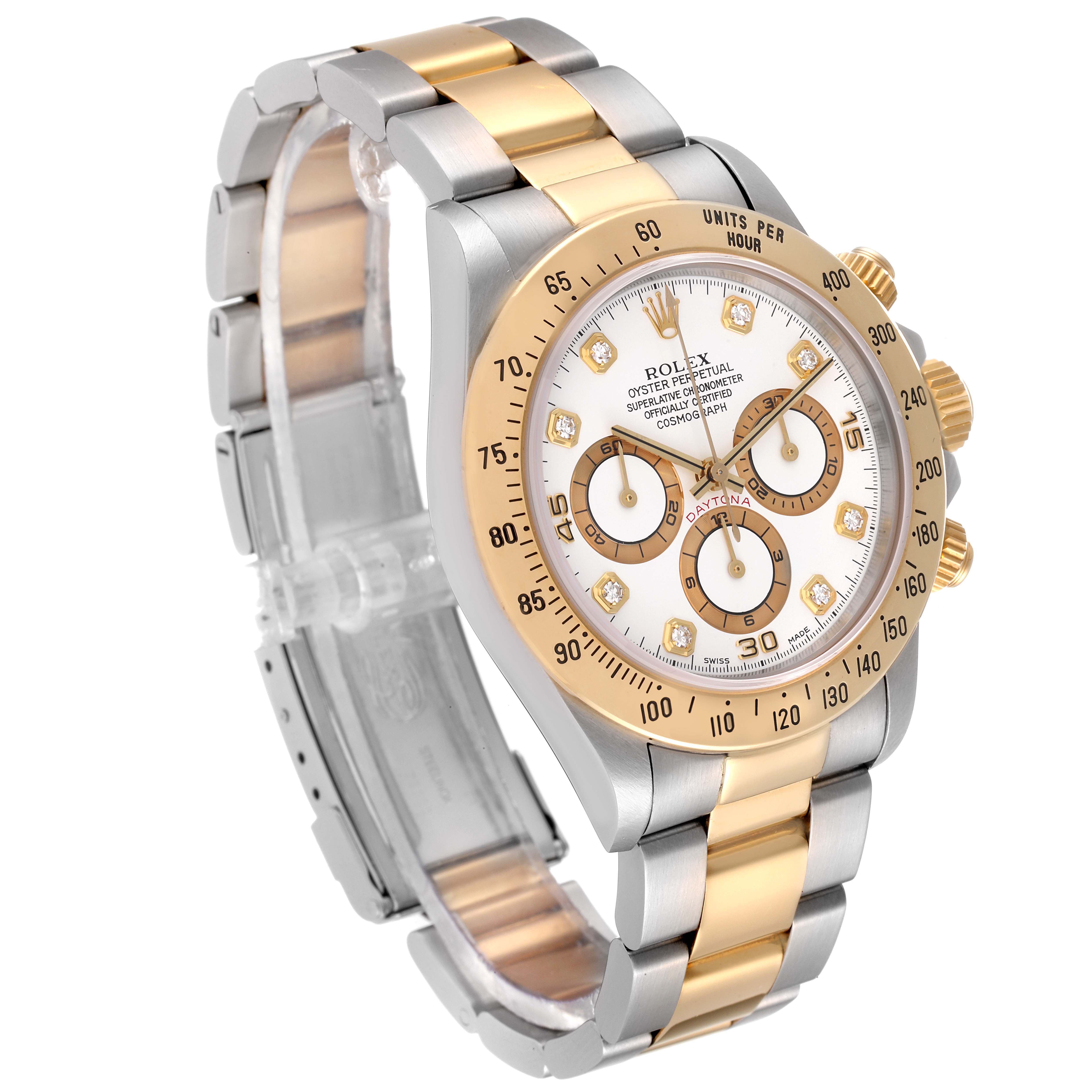 This image shows a Rolex Daytona 16523 Men's Steel and Gold (two tone) White Dial 16523 Men's Steel and Gold (two tone) White Dial watch from a front left angle, highlighting its dial, bezel, and bracelet.