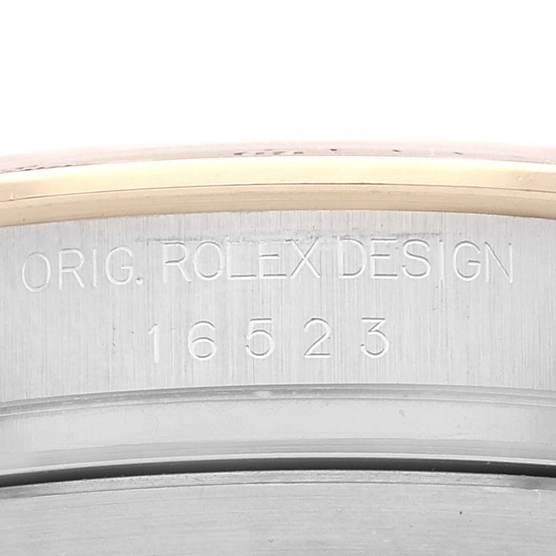 This image shows a close-up of the engraved case back of a Rolex Daytona 16523 Men's Steel and Gold (two tone) White Dial 16523 Men's Steel and Gold (two tone) White Dial watch, displaying the design number 16523.