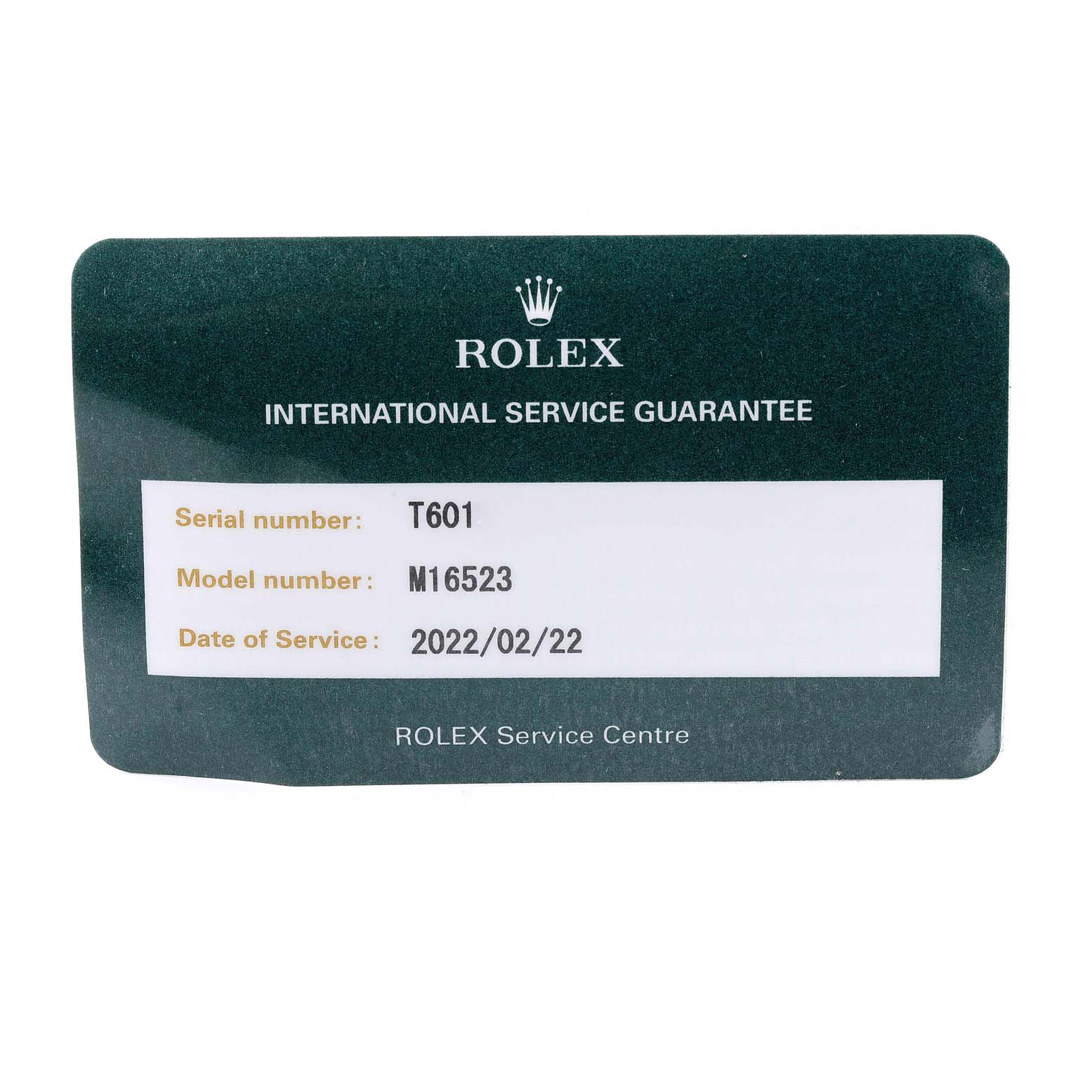 The image shows an international service guarantee card for a Rolex Daytona 16523 Men's Steel and Gold (two tone) White Dial 16523 Men's Steel and Gold (two tone) White Dial model, M16523, with service dated 2022/02/22.