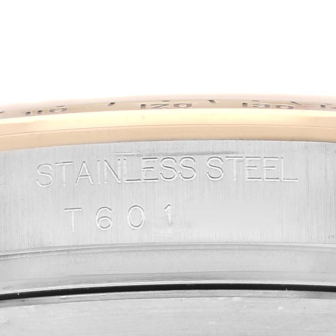 The image shows a close-up of the stainless steel casing with the engraved model number of a Rolex Daytona 16523 Men's Steel and Gold (two tone) White Dial 16523 Men's Steel and Gold (two tone) White Dial watch.