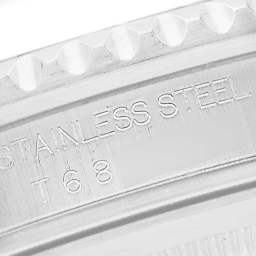 Close-up of the stainless steel inscription on the bezel or case of a Rolex GMT-Master 16710 Men
s Stainless Steel Black Dial 16710 Men
s Stainless Steel Black Dial watch.