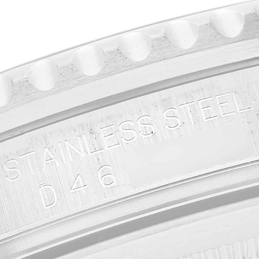 This close-up image shows the engraved text on the stainless steel case back of the Rolex GMT-Master 16710 Men's Stainless Steel Black Dial 16710 Men's Stainless Steel Black Dial watch.