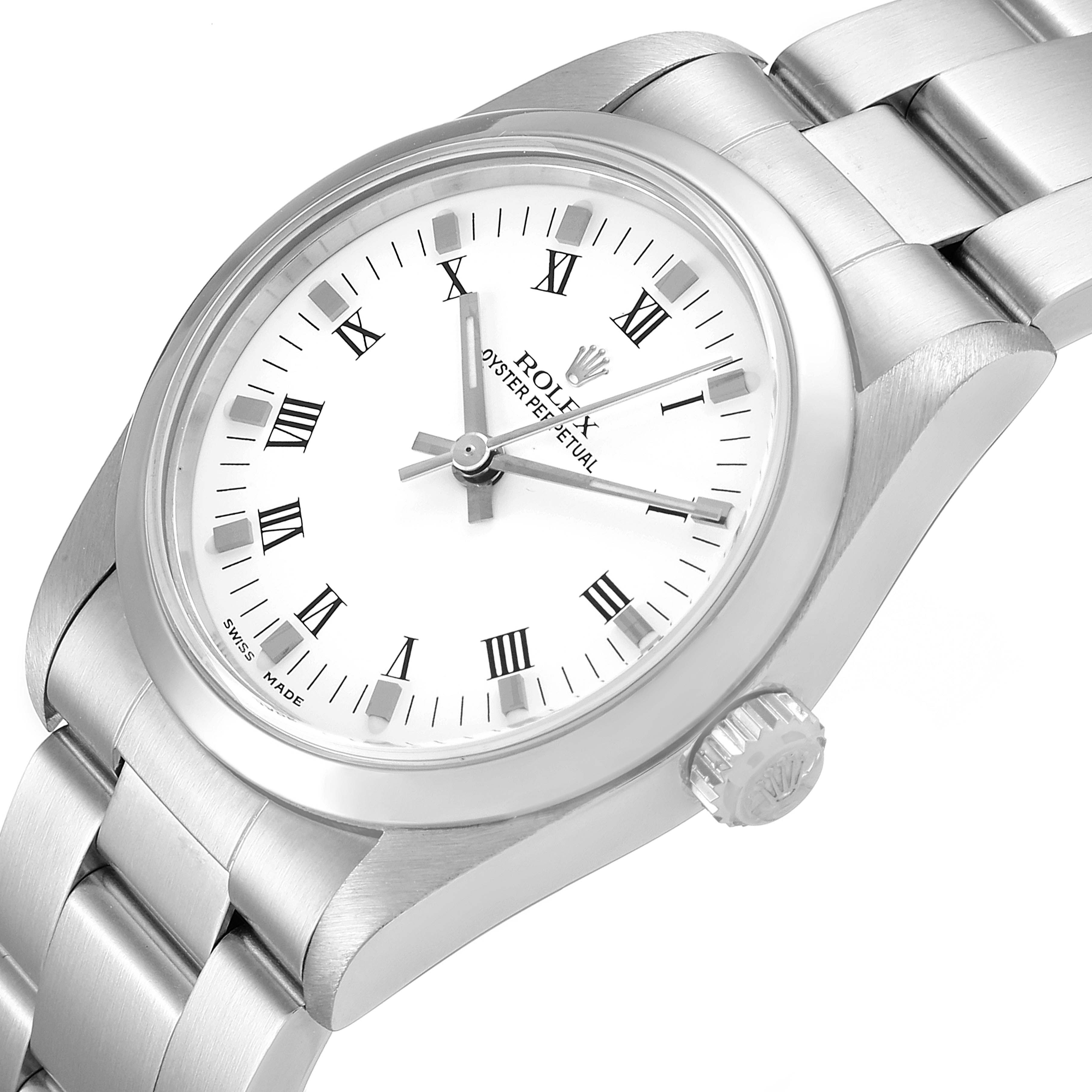 This image shows a Mid-Size Rolex Oyster Perpetual watch at a slight angle, displaying the face, crown, and part of the bracelet.