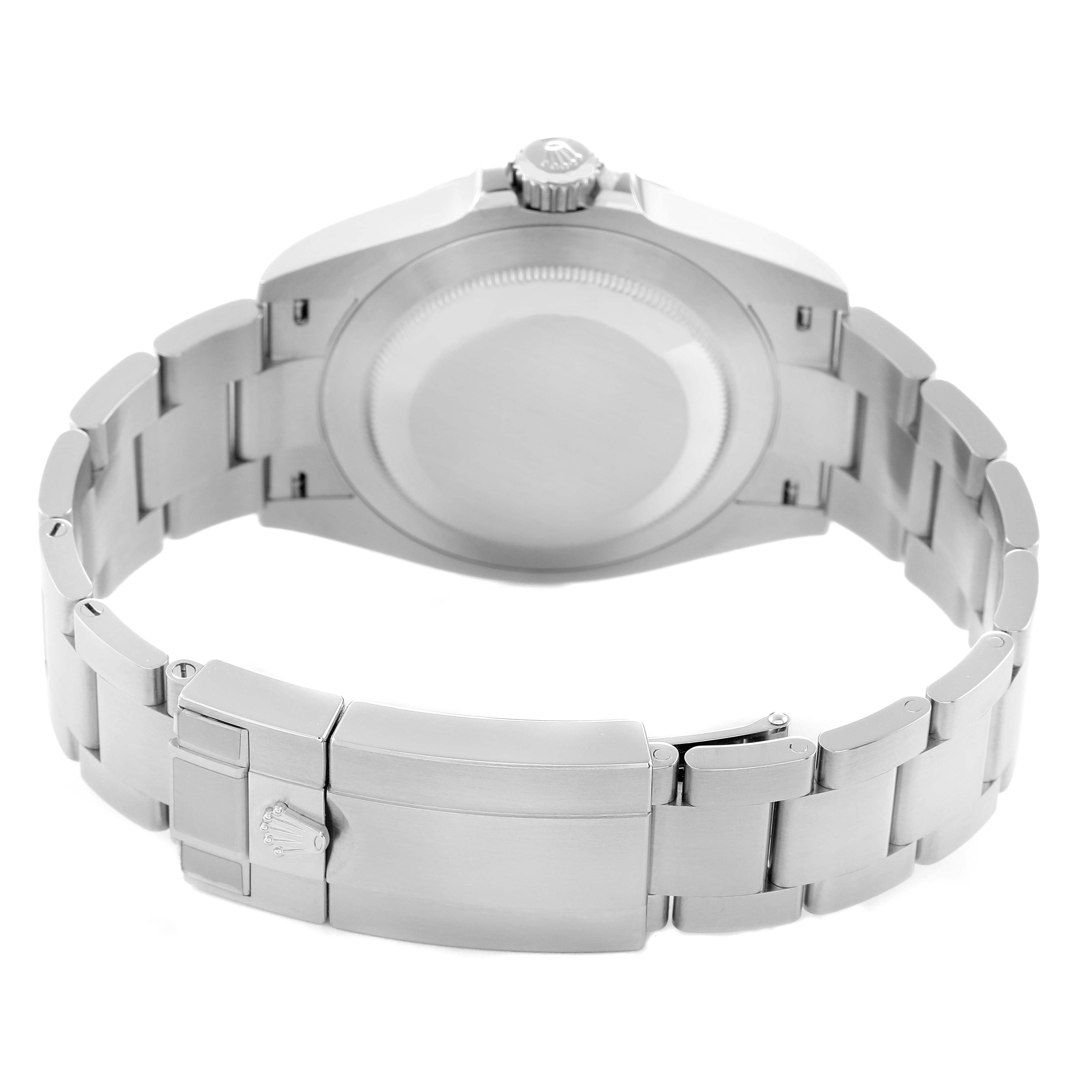 The image shows the back view of a Rolex Air-King model 126900, highlighting the bracelet, clasp, and case back.