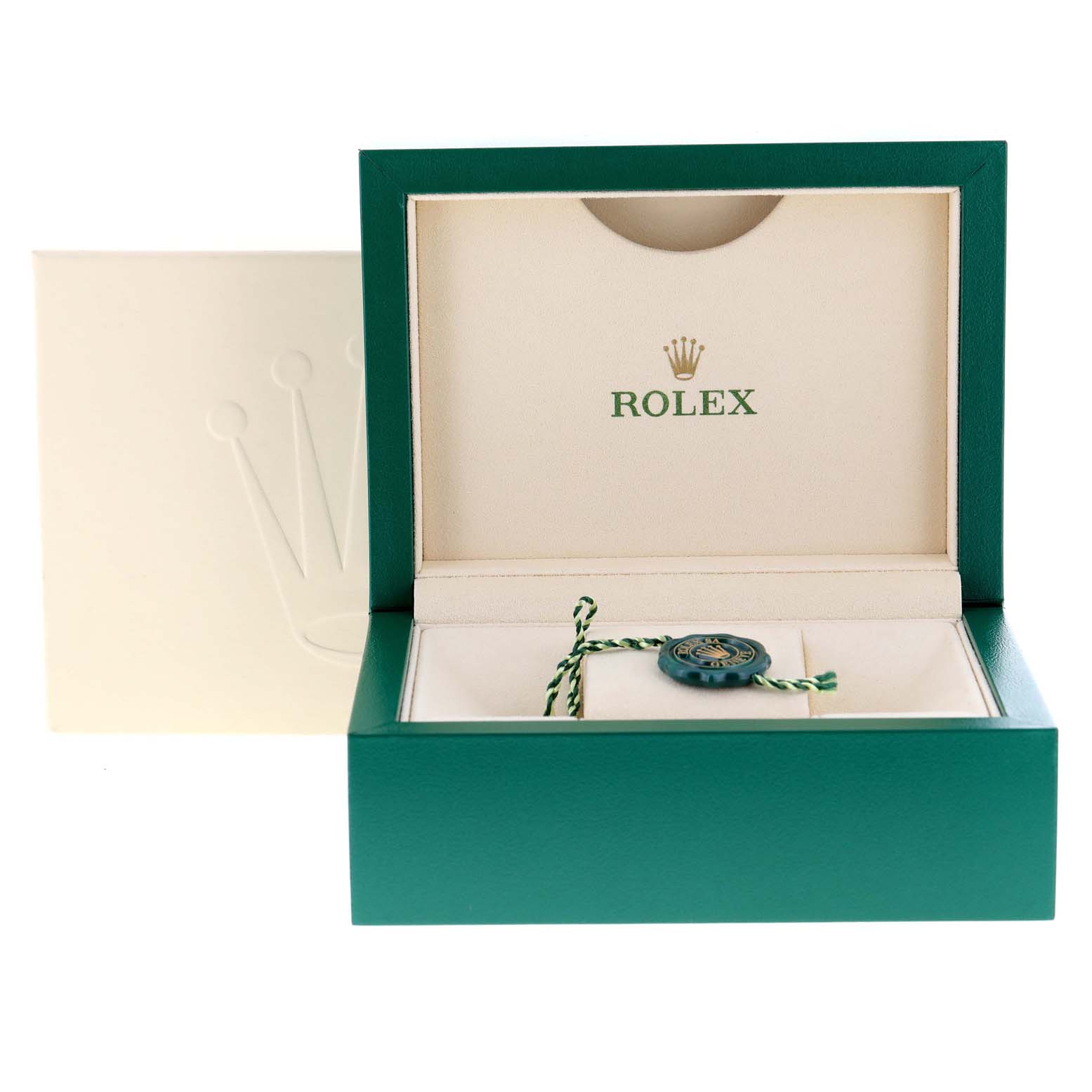 This image shows the open green and cream box of the Rolex Oyster Perpetual 177200 Men
s Stainless Steel Blue Dial 177200 Men
s Stainless Steel Blue Dial, displaying a tag and the Rolex logo.
