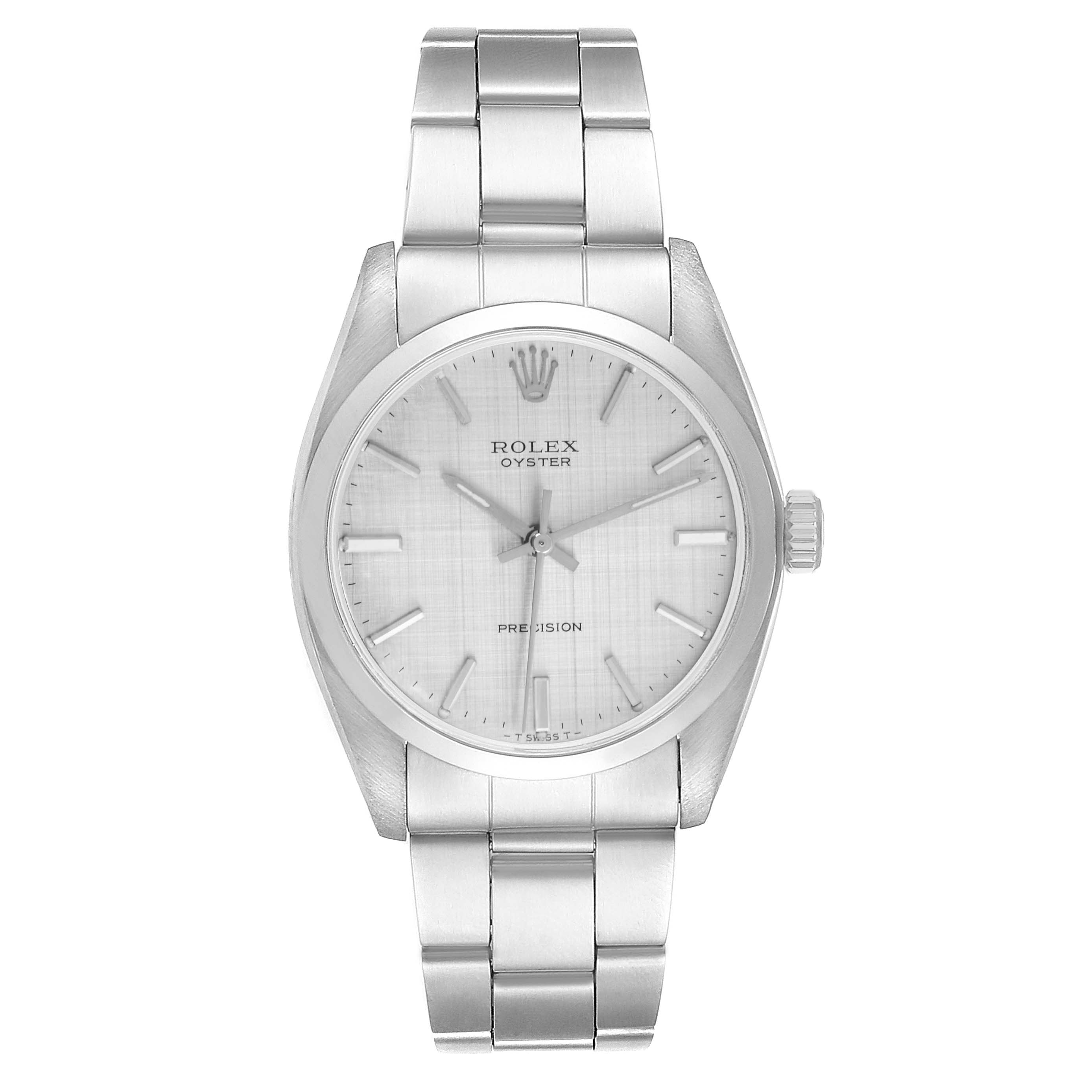 The Rolex Vintage Collection model 6426 watch is shown from a front angle, displaying the full face, crown, and stainless steel bracelet.