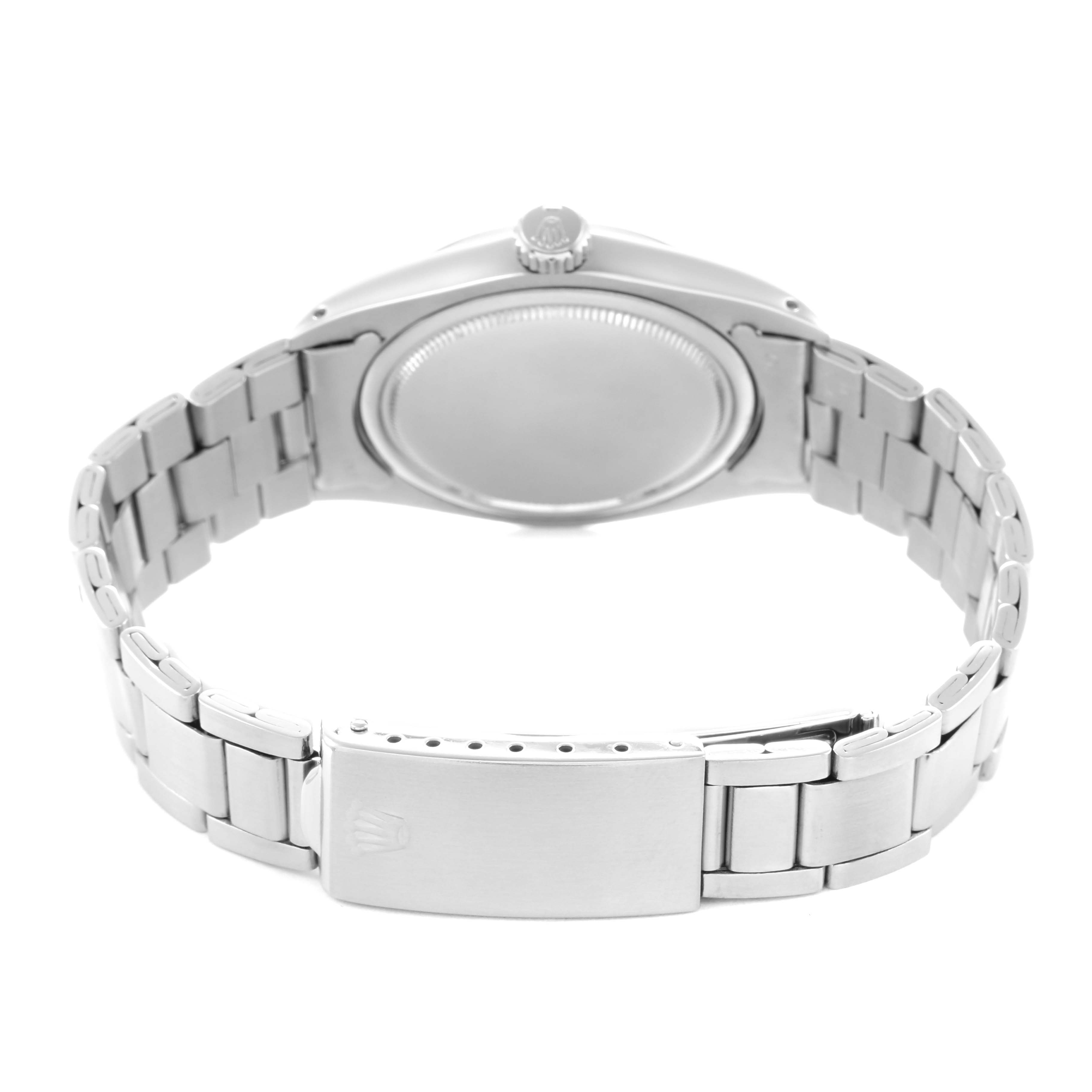 The image shows the back of the Rolex Vintage Collection model number 6426 men
s watch, highlighting the case back and metal bracelet with clasp.