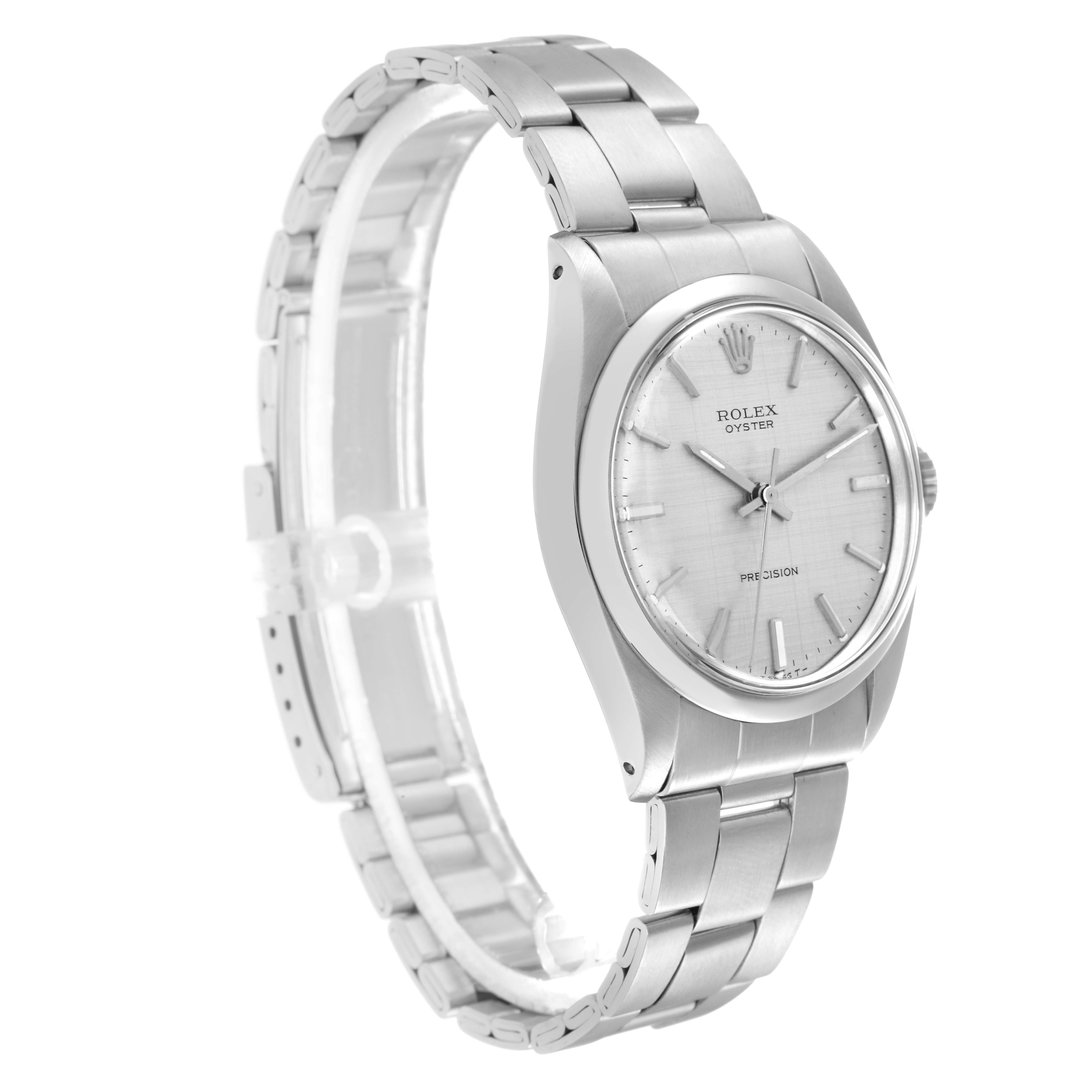 The Rolex Vintage Collection model number 6426 is shown at a three-quarter angle, highlighting the face, bezel, crown, and bracelet.