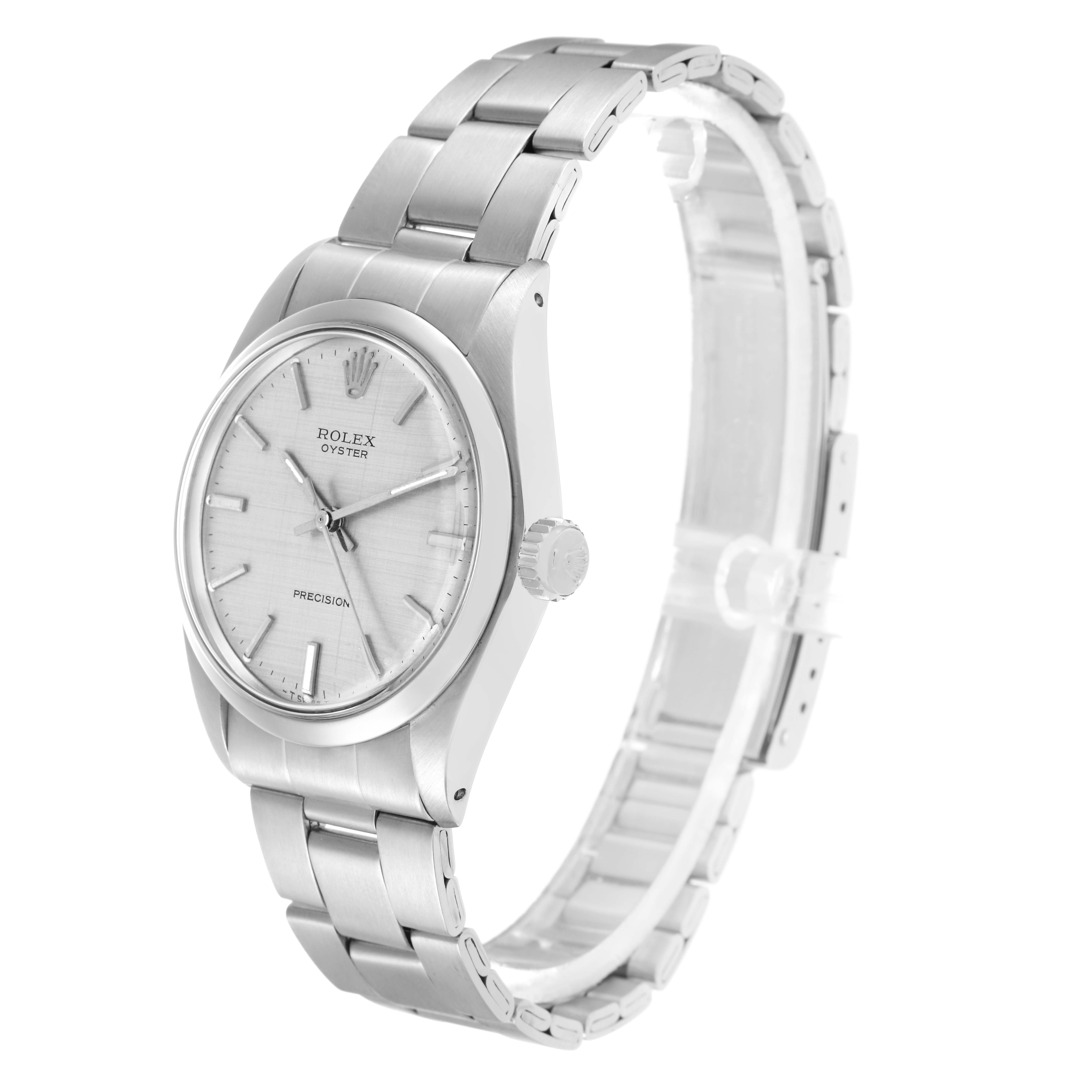 The Rolex Vintage Collection model 6426 watch is shown at an angle highlighting its face, bezel, crown, and bracelet.