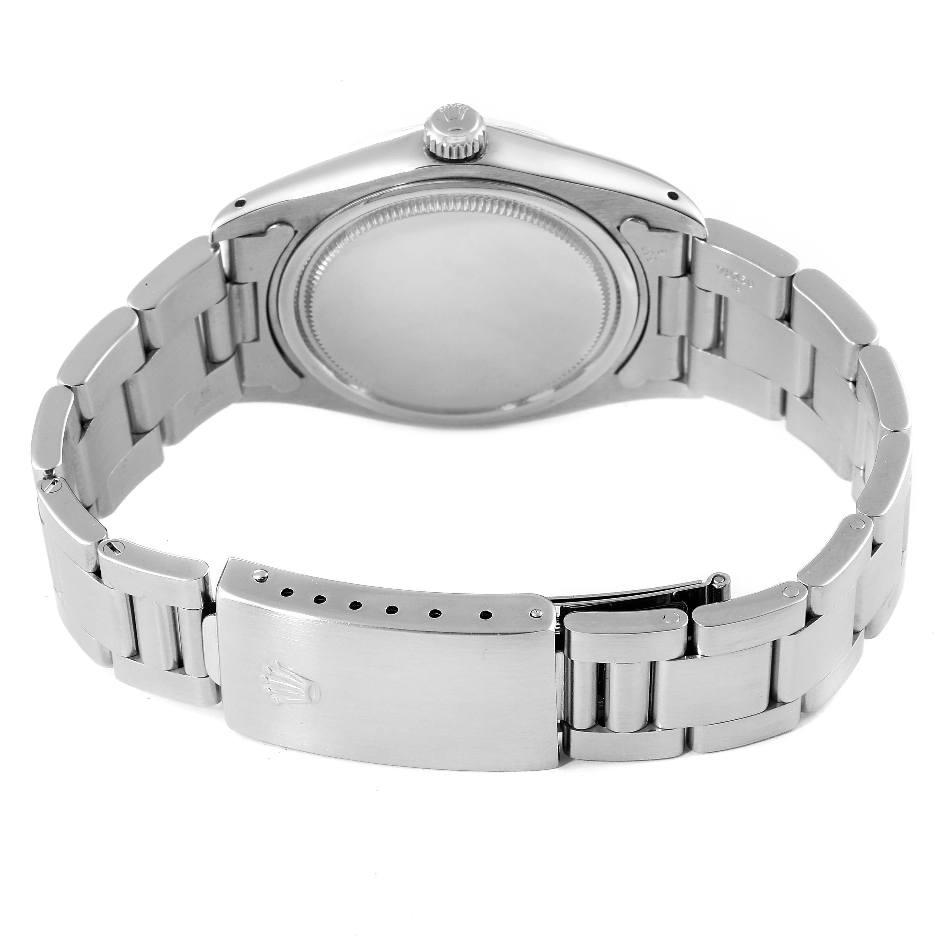 The image shows the backside and clasp of a Rolex Vintage Collection 6694 Men's Stainless Steel Silver Dial 6694 Men's Stainless Steel Silver Dial watch at a slight angle from the rear.