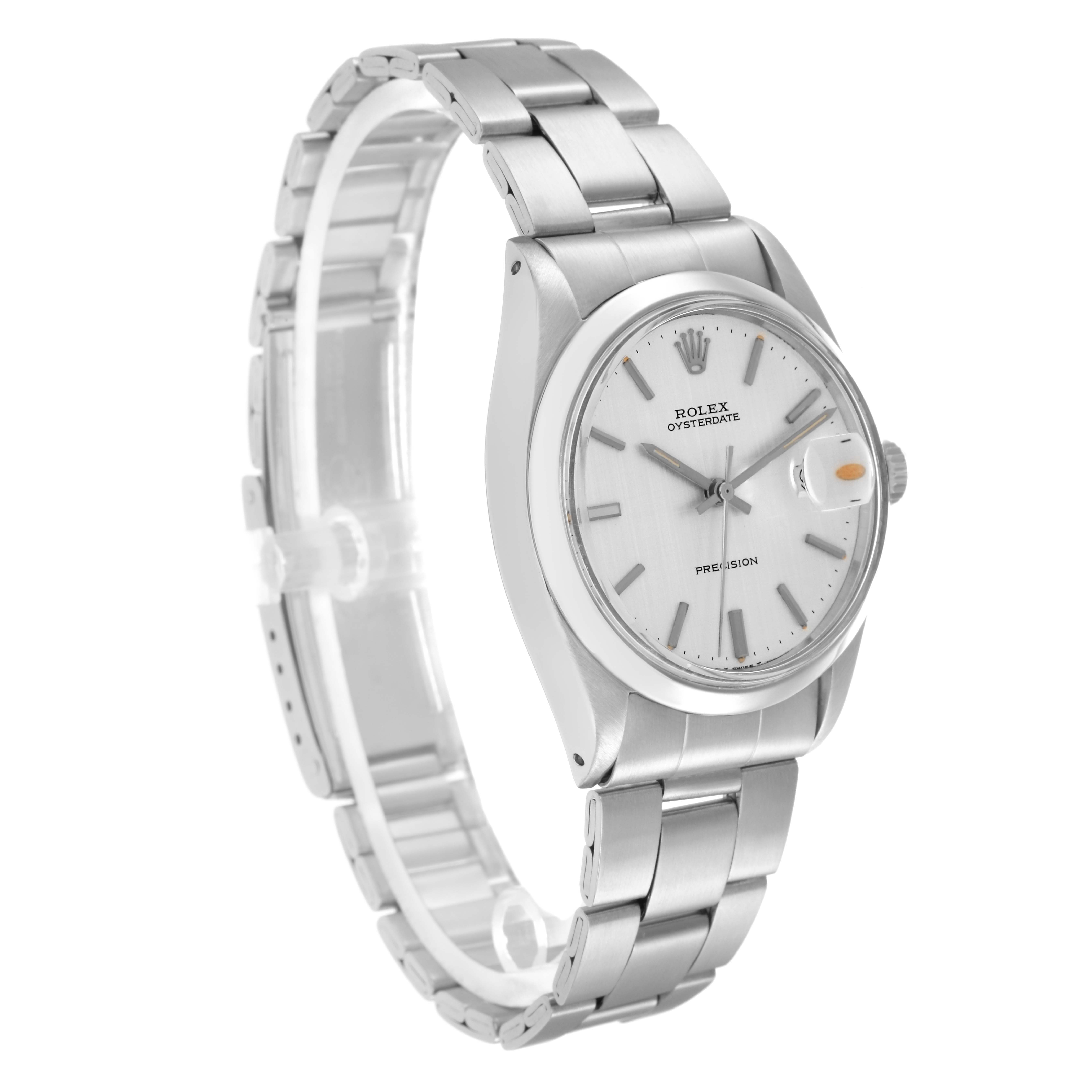 The Rolex Vintage Collection model 6694 is shown at a slight angle highlighting the silver dial, hour markers, Oyster bracelet, and cyclops lens on the date window.