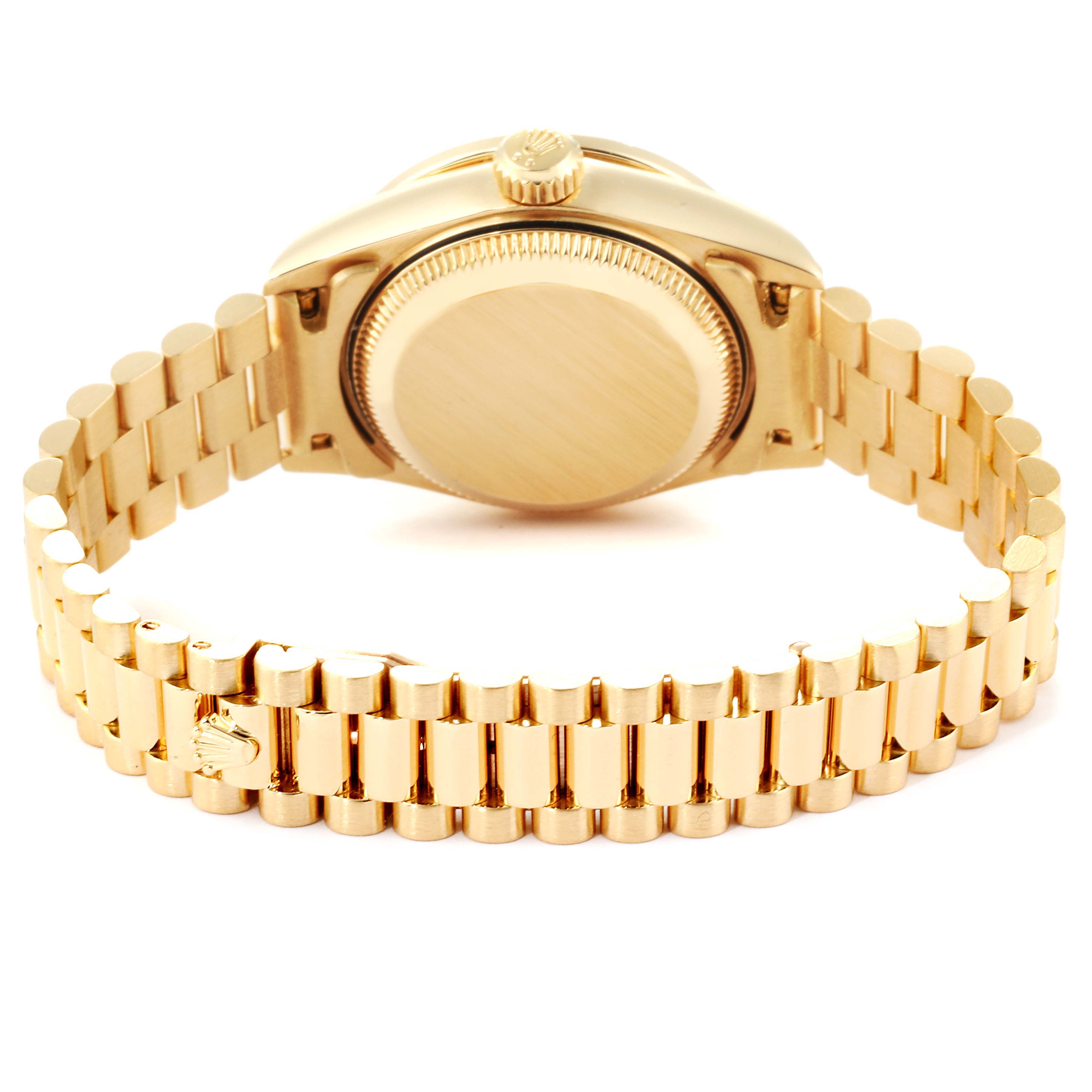This image shows the back case and bracelet of a Rolex President 79178 Women
s Yellow Gold Champagne Dial 79178 Women
s Yellow Gold Champagne Dial model watch from a rear angle.
