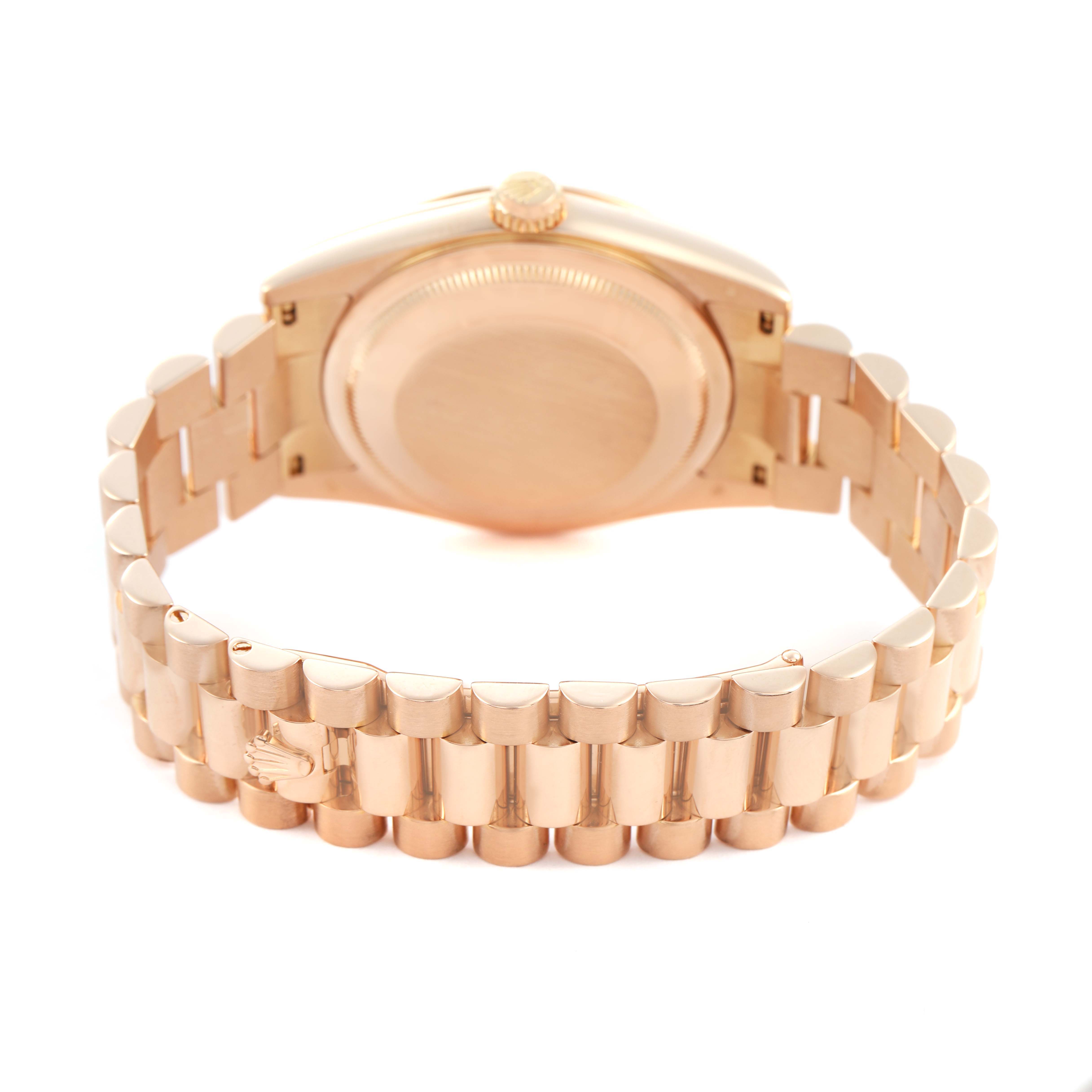 The image shows the back and bracelet of a Rolex President 118235 Men's Rose Gold Pink Dial model watch, highlighting the clasp and lug area.