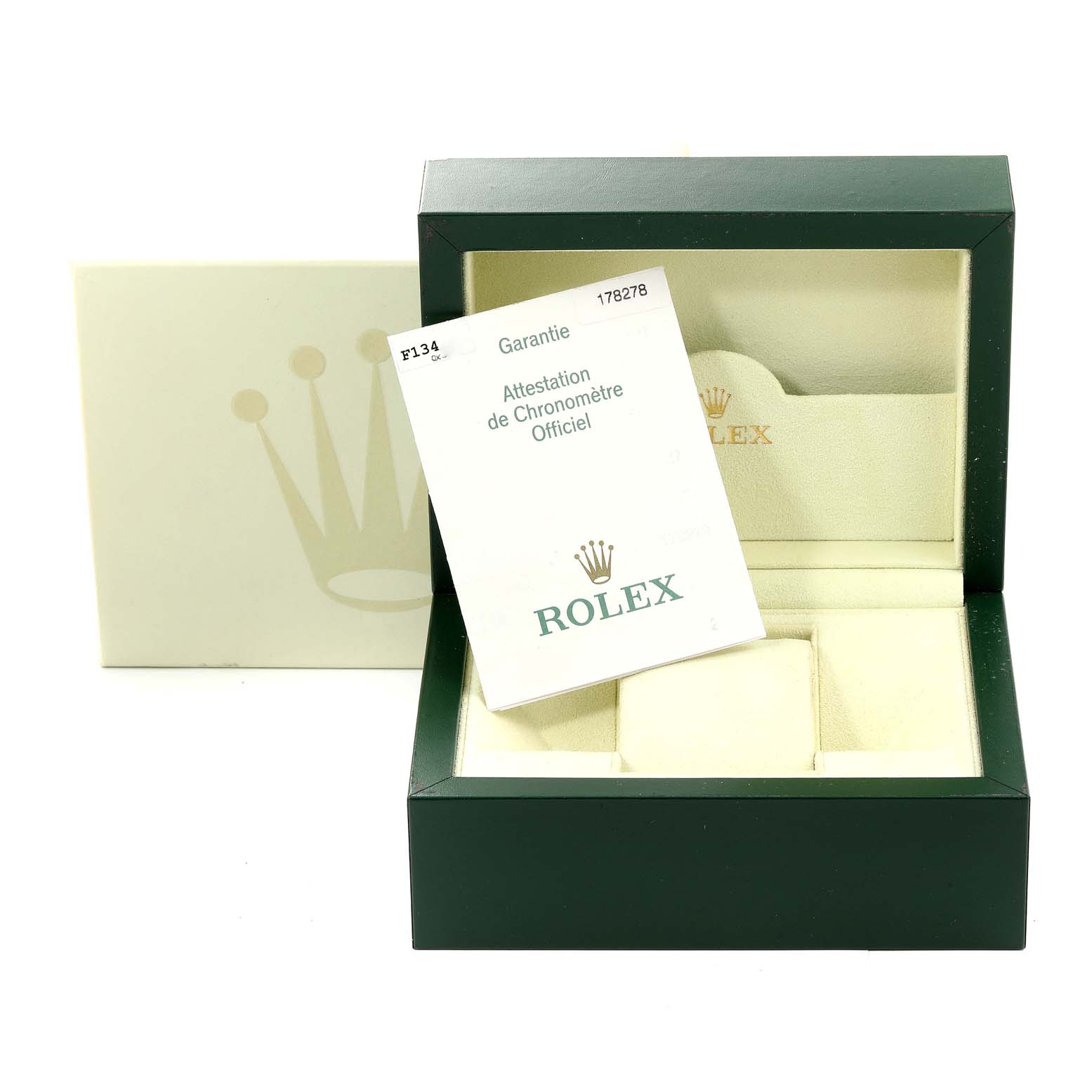 The image shows an empty Rolex President 178278 Women's Yellow Gold Champagne Dial 178278 Women's Yellow Gold Champagne Dial watch box with a warranty card placed at an angle.