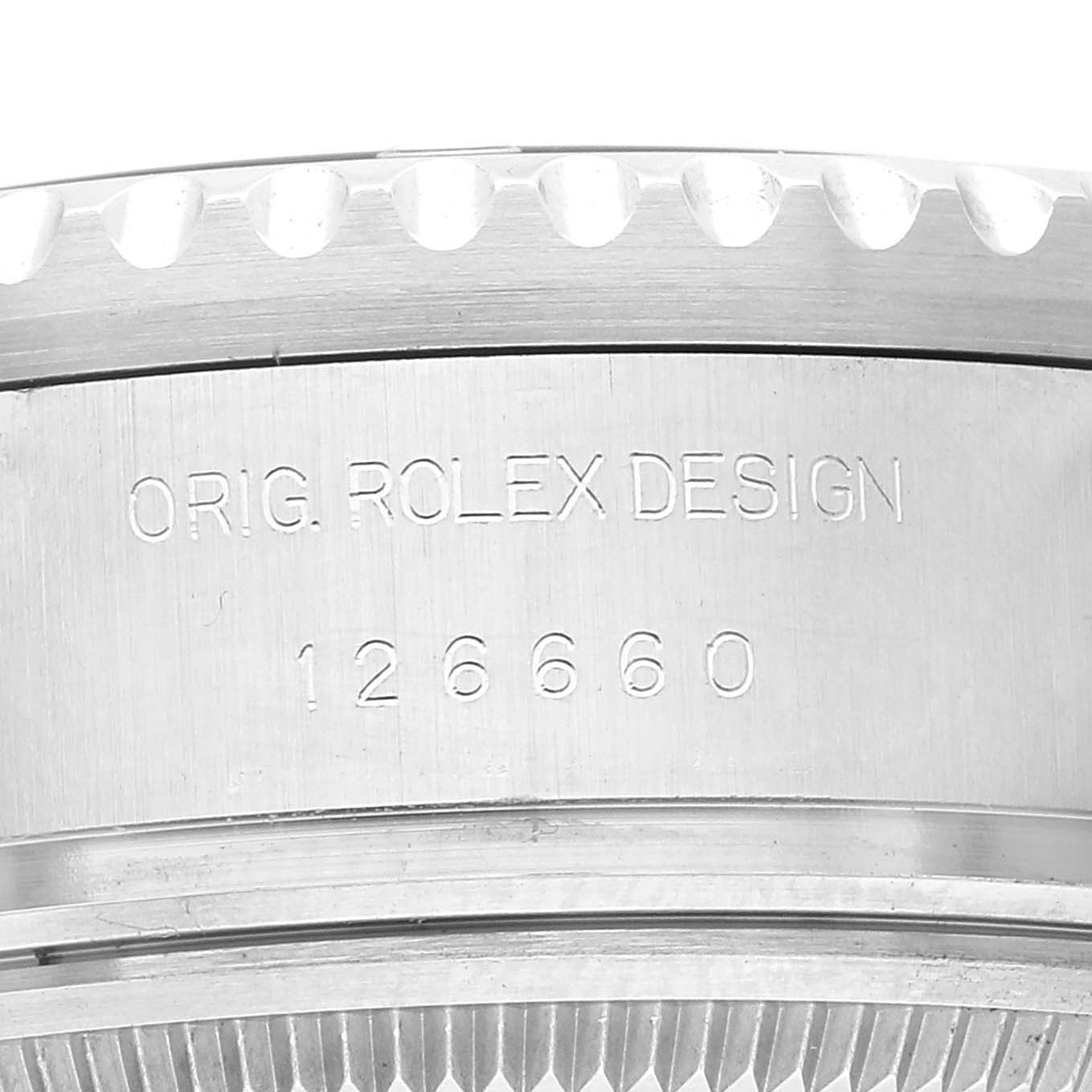 The image shows a close-up of the side of a Rolex Sea-Dweller 126660 Men's Stainless Steel Black Dial 126660 Men's Stainless Steel Black Dial watch case, displaying the model number "126660" and "ORIG. ROLEX DESIGN" engraving.
