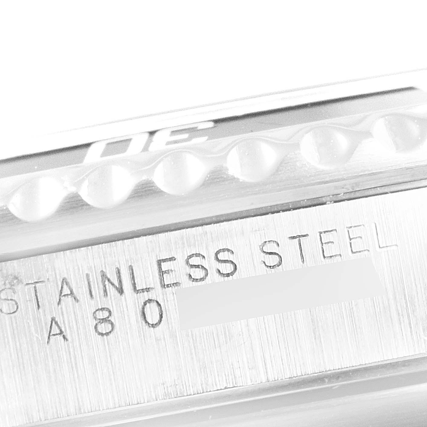 This image shows a close-up angle of the stainless steel case and bezel of a Rolex Submariner 14060M Men
s Stainless Steel Black Dial 14060M Men
s Stainless Steel Black Dial watch.