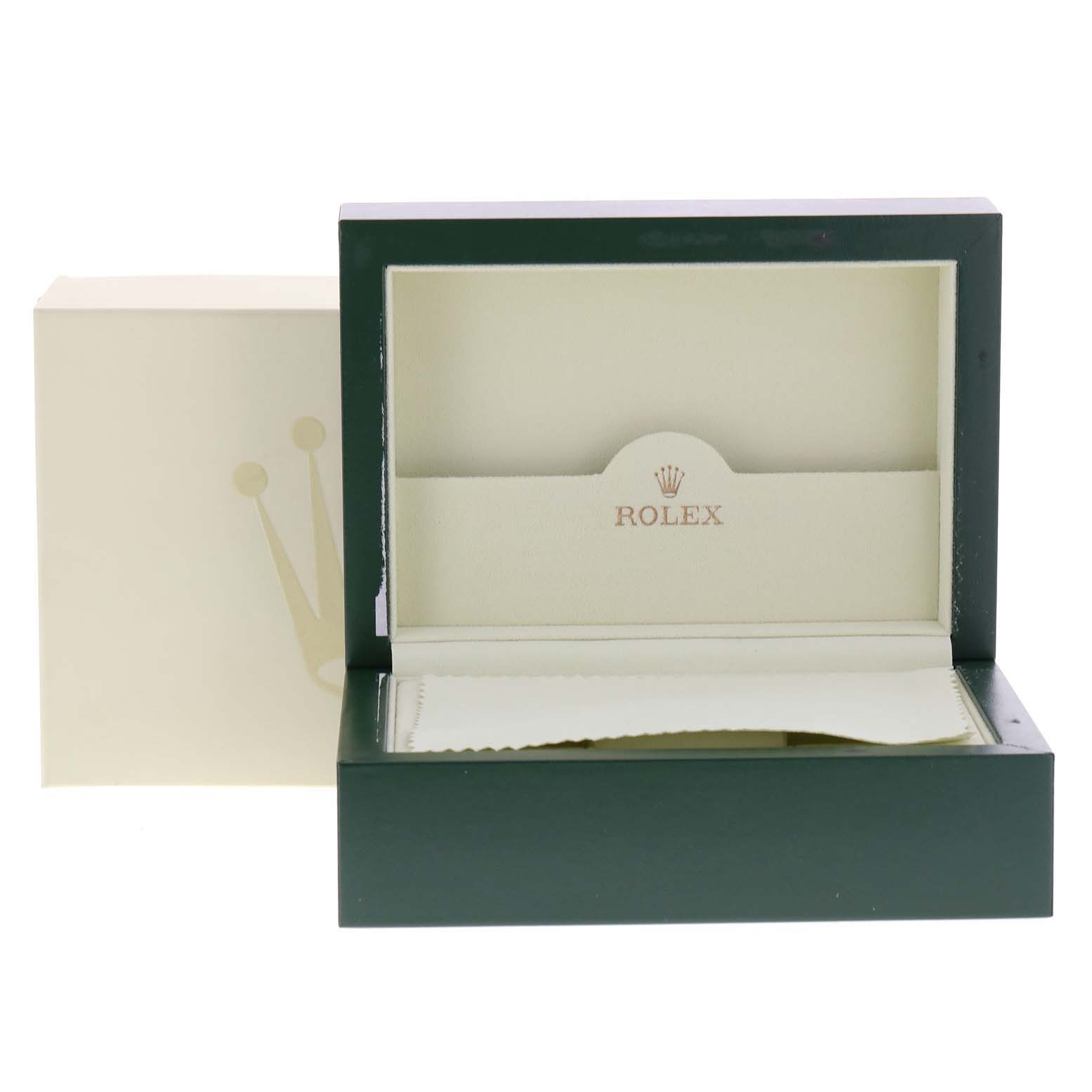 The image shows an open Rolex Submariner 16610 Men
s Stainless Steel Black Dial 16610 Men
s Stainless Steel Black Dial watch box with the logo visible inside.